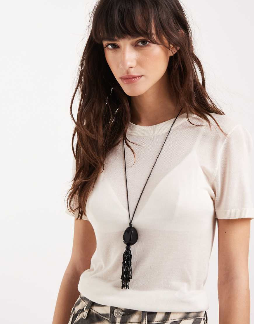 ASOS DESIGN long corded necklace with tassel pendant in black | ASOS (Global)