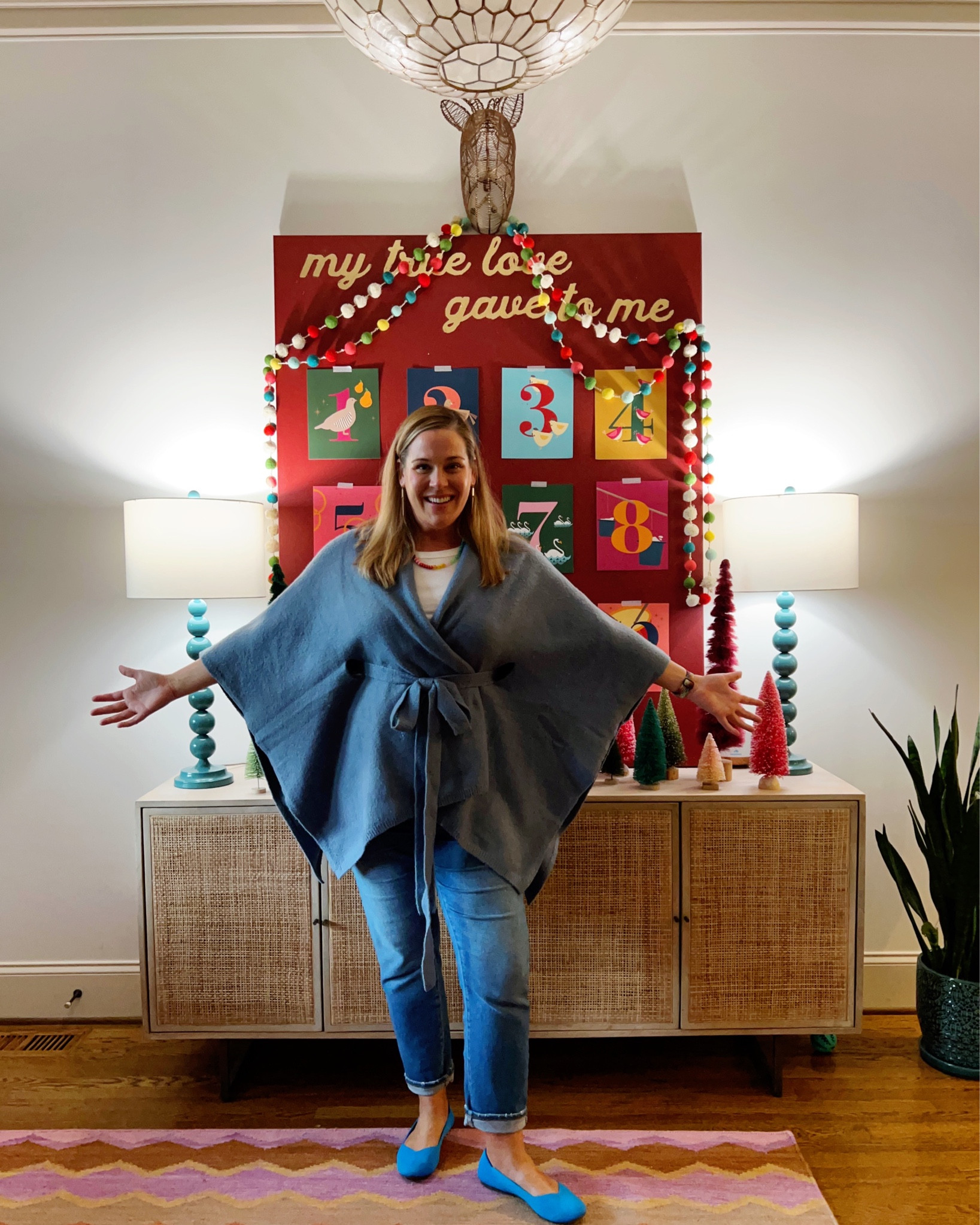 Poncho sweater, poncho wrap sweater, belted sweater, Christmas decor, Christmas art, Christmas entryway, bottlebrush trees 

#LTKhome #LTKSeasonal #LTKHoliday