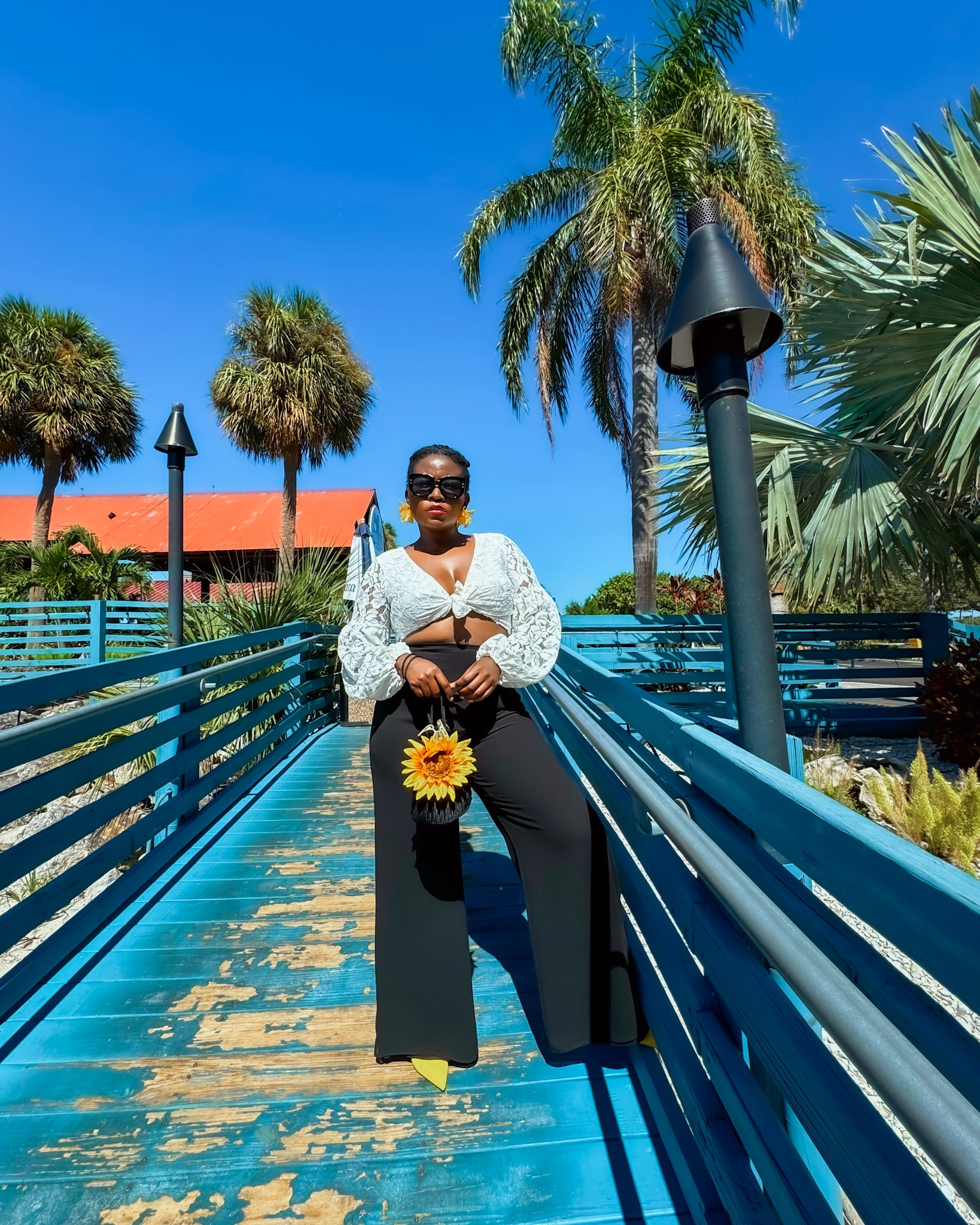 Brunch at the world-famous Barefoot Tiki Bar at Whisky Joe’s is always a vibe! There’s just something about the cool sea breeze, sunshine, and waterfront views that makes everything better.

 Kicking off my weekend with some tropical goodness and, of course, the perfect brunch look!

 DIY sunflower bag + Earrings adds that playful pop of sunshine. 

lace crop top with billowing sleeves, wide-leg pants that elongate, and my favorite oversized sunnies to beat the Florida heat. Let’s just say, I’m feeling all the coastal vibes today!
Wide leg pants 

#LTKSeasonal #LTKFindsUnder100 #LTKStyleTip