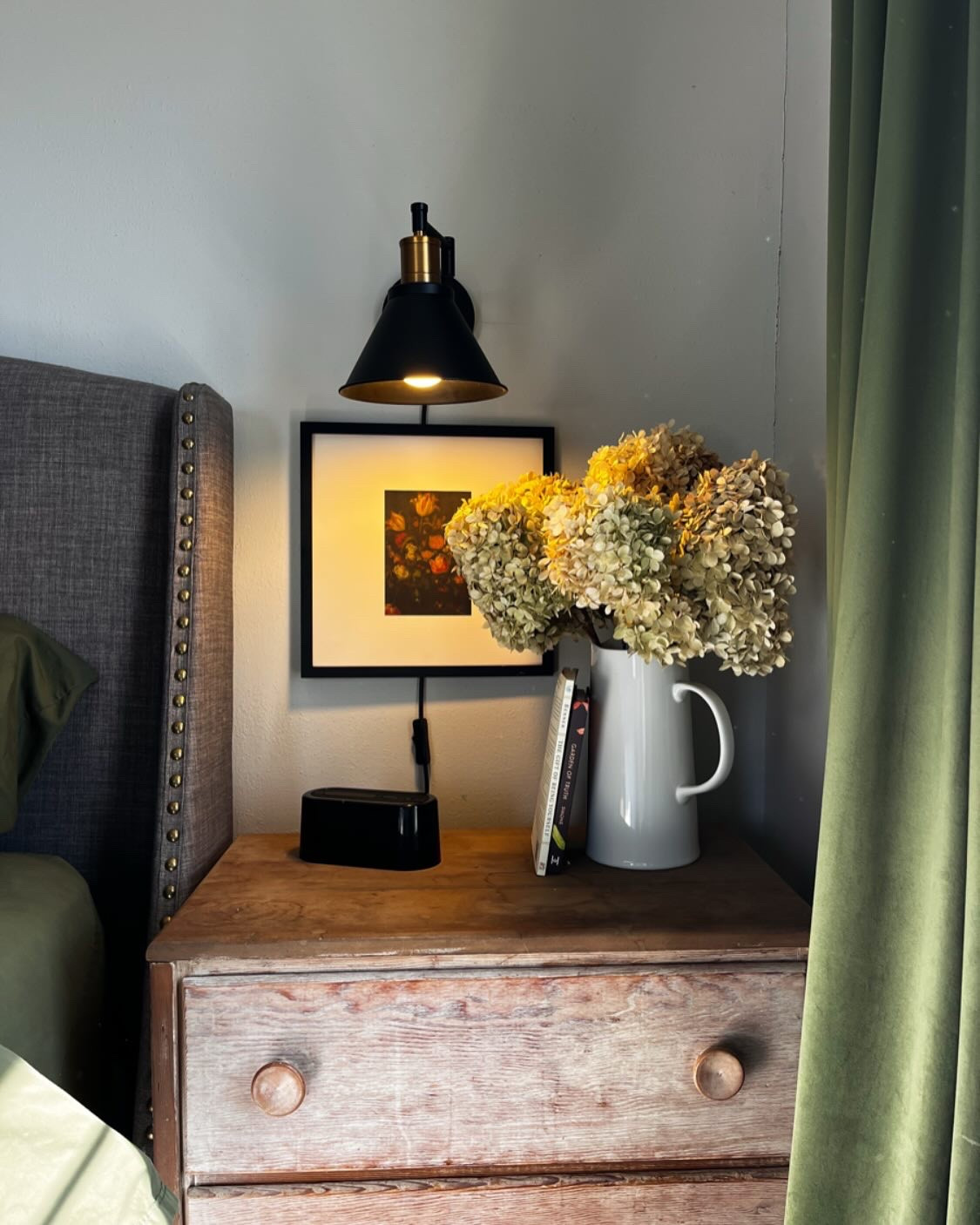 There’s something about a cozy bedroom corner that makes everything feel a little more peaceful. This little nook—with its worn wood, vintage blooms, and a soft glow from the sconce—is one of my favorite spots in the house. A simple reminder that beauty doesn’t have to be complicated.

Follow me @henry_house_designs for more inspiration

nightstand styling | cozy bedroom | vintage charm | collected home

#bedroomdecor #vintagehome #cozycorner #nightstandstyling #midwestdecorator #neutralhome #collectedandcurated #interiorinspo