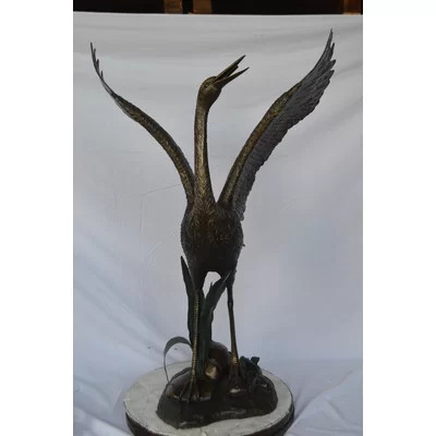 Crane standing on a stone bronze statue - Size: 28"L x 32"W x 49"H. | Wayfair North America