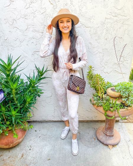 This tie dye jumpsuit is so soft. I paired it with converse, a hat, and a checkered crossbody! #summerfashion #designerinspired 

#LTKFindsUnder100 #LTKStyleTip #LTKFindsUnder50