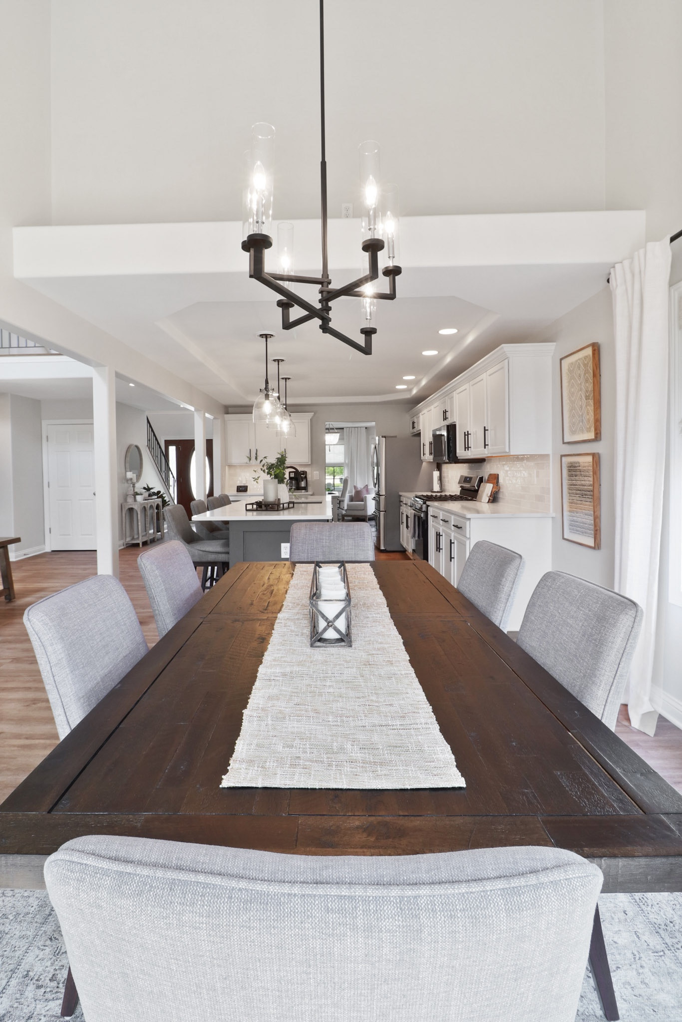 dining room, table, chandelier, table runner, kitchen seating, dining seating, centerpiece, candle, wall art, long wood table

#LTKstyletip #LTKhome