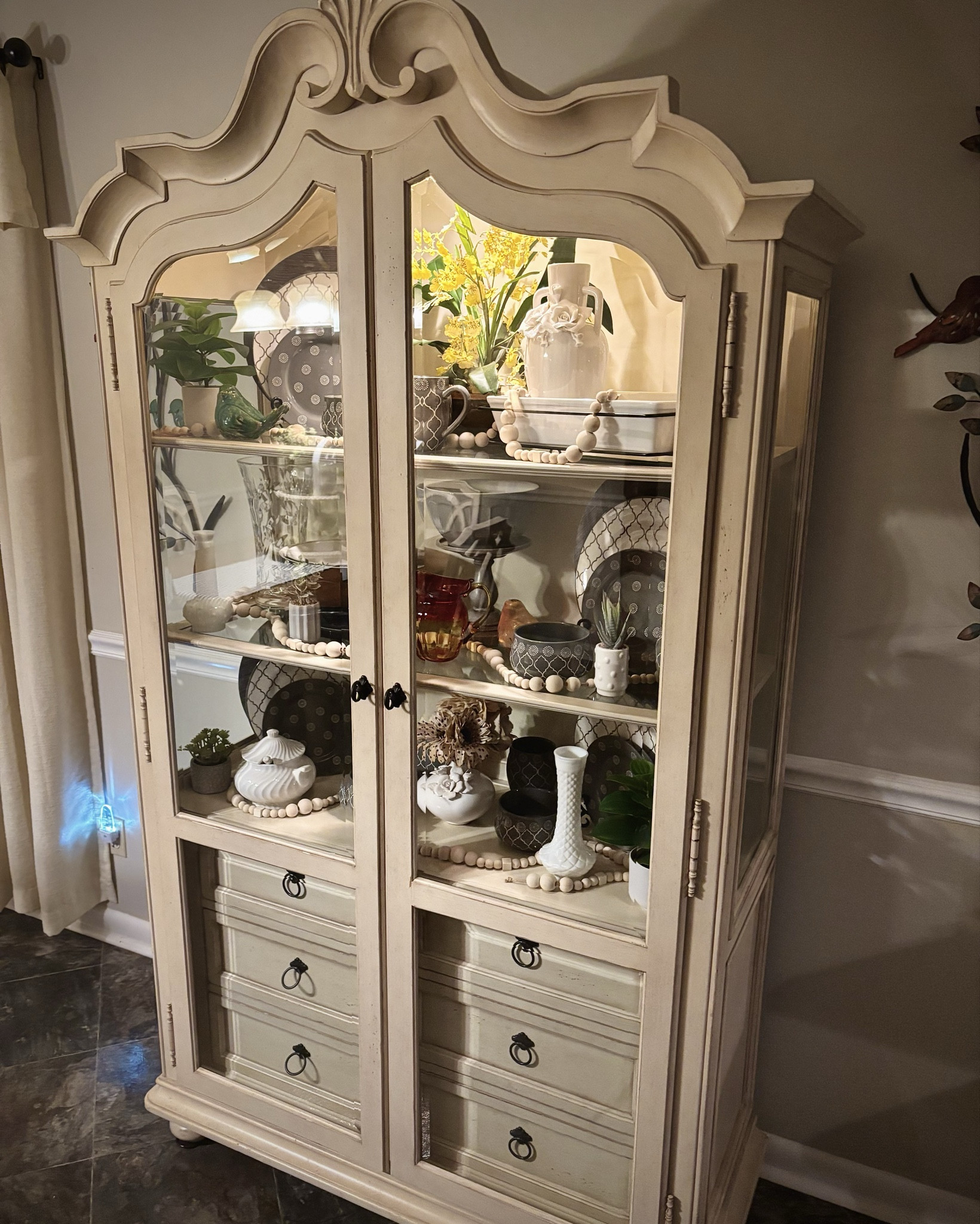 A farmhouse style display china cabinet adds so much texture, life & elegance to the dining area. These can shine in several places in your home, even consider your den withholding such an eye treat! 
| China decor | french country | vintage cottage style | shop my items | decor inspo | #LTKCyberWeek 

#LTKHoliday #LTKGiftGuide #LTKSaleAlert