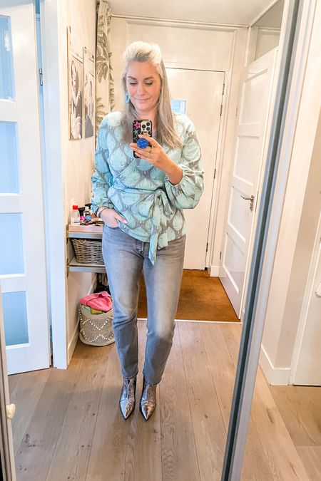 Ootd - Wednesday. Turquoise wrap top (Norah, current, tts) paired with grey Levi’s 501 jeans and silver heeled booties. 



#LTKover40 #LTKworkwear #LTKeurope