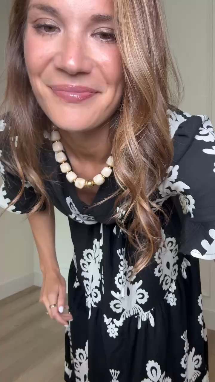 This printed midi dress is one of those effortless pieces you can wear for so many occasions. The flowy fit is comfortable, the black and white print makes a statement, and it’s easy to dress up with wedges or keep casual with sandals. 

Printed midi dress, black and white dress, flowy dress, modest dress, vacation outfit, everyday dress, summer style, feminine outfit, Amazon fashion, effortless style, StangandCo

#LTKootd #LTKSeasonal #LTKTall