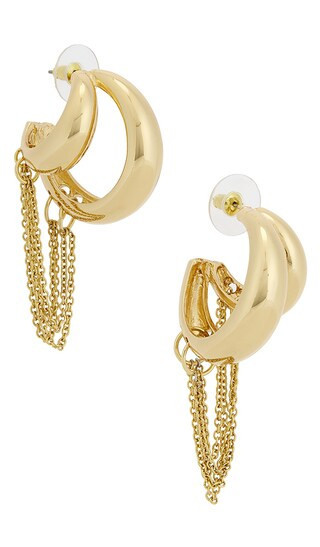 petit moments Mirage Earrings in Metallic Gold. | Revolve Clothing (Global)