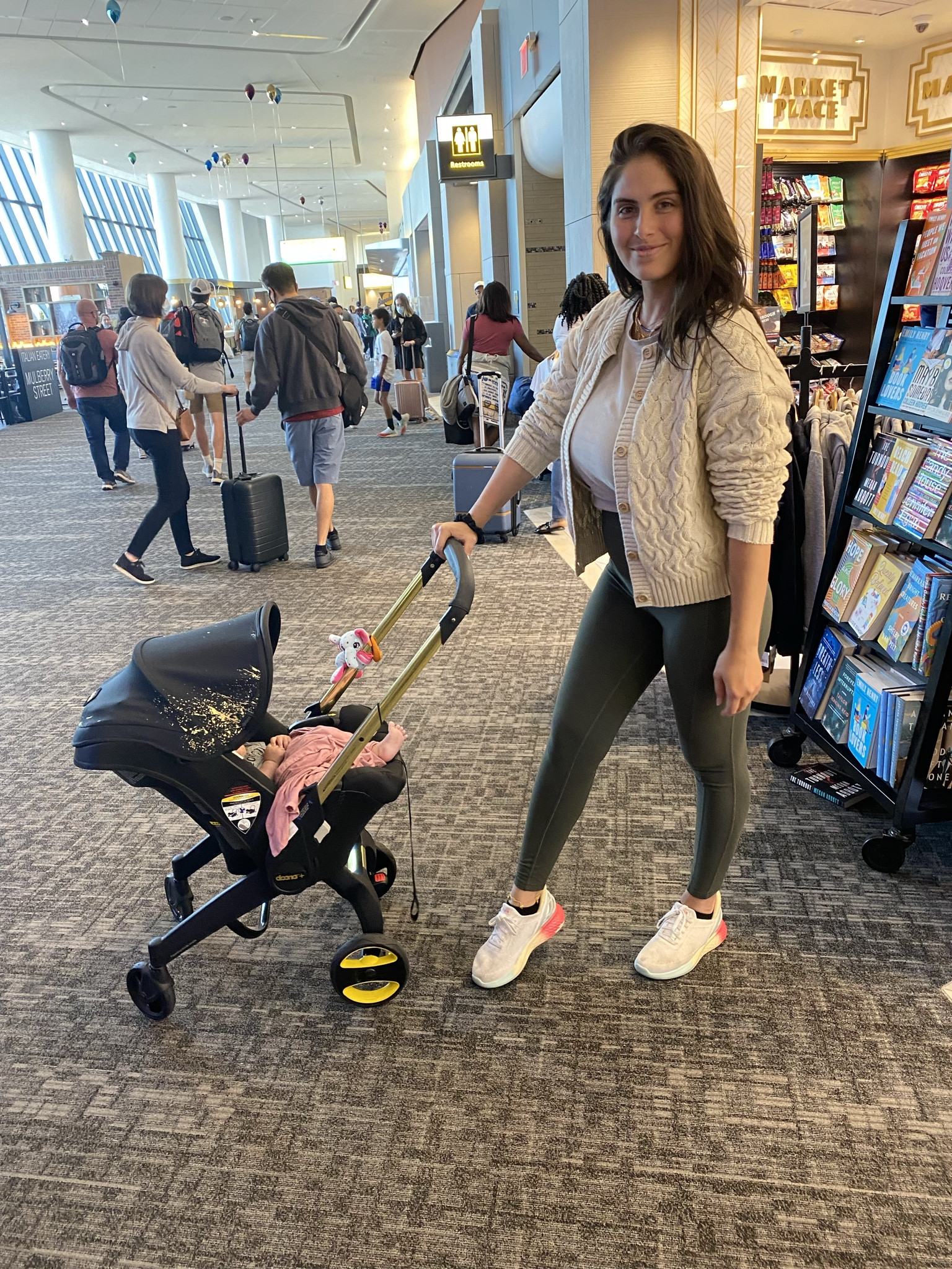 Baby travel was one of my biggest questions when I first had Riv but I took all these photos and then didn’t want to publish them because I felt so strange in my PP body - you can see it in my pose. Somedays I was confident, other days I was holding it together to not be so down. Thankful for inclusive brands like Universal standard who make you look good no matter what size!

My favorite travel companion and I LOVED the Doona. You can beat an all in one with a great safety rating. Toting one less item because car seat and stroller were one and the same was a big must have for me. Also loveeeee the turn radius and lightweight nature of the Doona! 

Second best for PP and pregnancy - Kizik shoes. Not having to bend down and slip these comfy and functional shoes on like slippers - CHEF’S KISS

#LTKbaby #LTKsalealert #LTKtravel