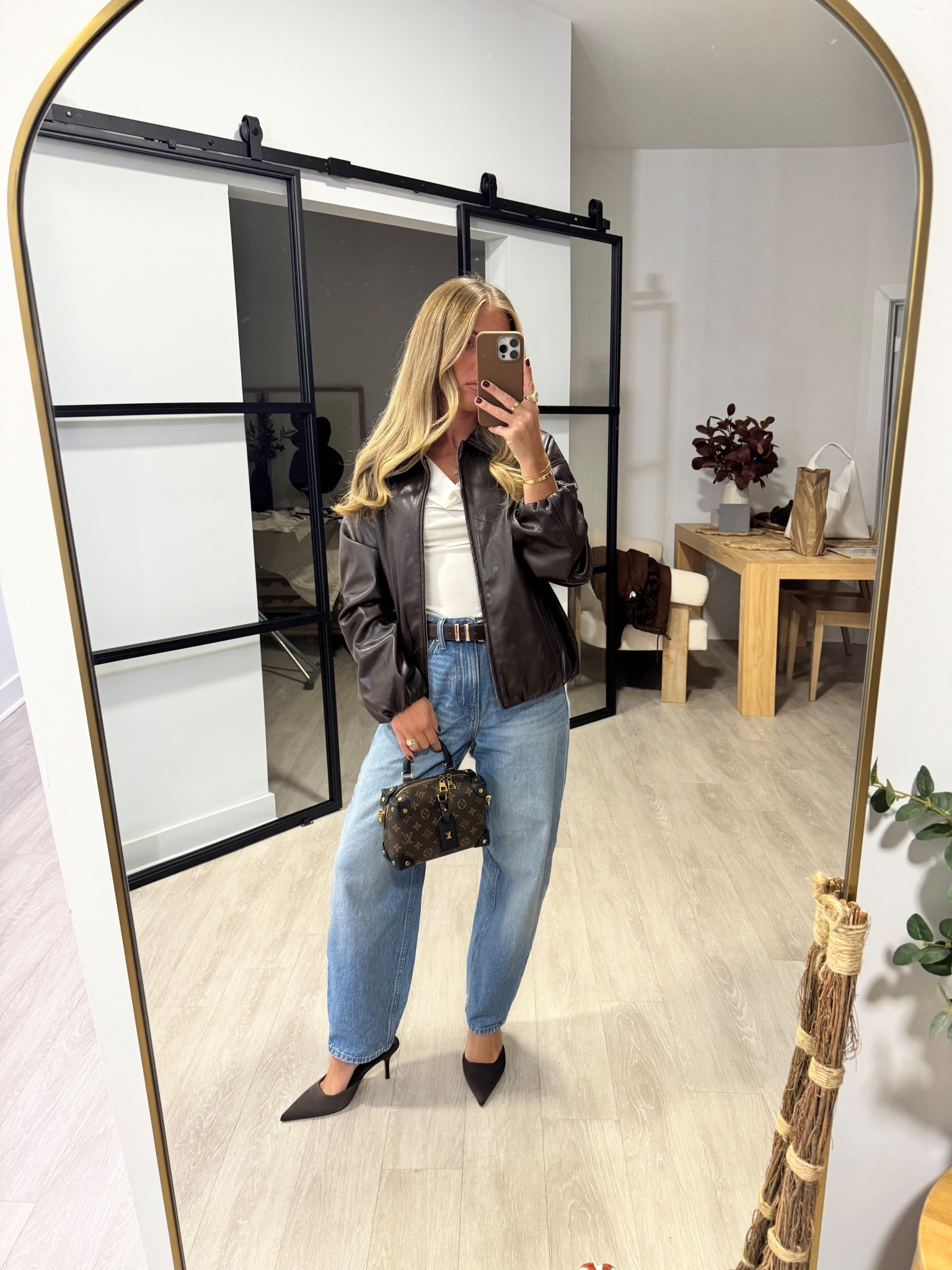 Perfect chocolate brown heels in satin (also come in suede) heel height: 3.14

Chocolate brown leather jacket from Zara: 4341/736

#LTKShoeCrush