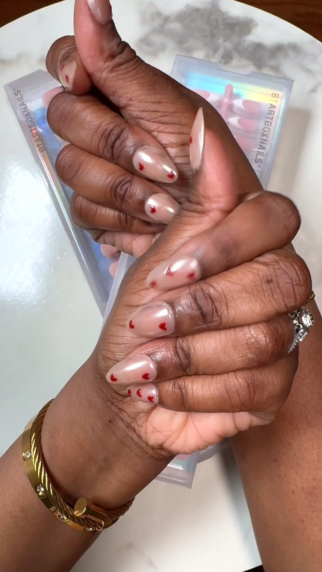 
The nail shop is cute… but my schedule is NOT 😂
BTArtbox sent me their Valentine’s press-on nails and I did this whole set at home in under 15 minutes.
Mom life approved ✔️ 
Budget approved ✔️
#valentine #btartbox #pressonnails 

#LTKgrwm #LTKBeauty #LTKValentine