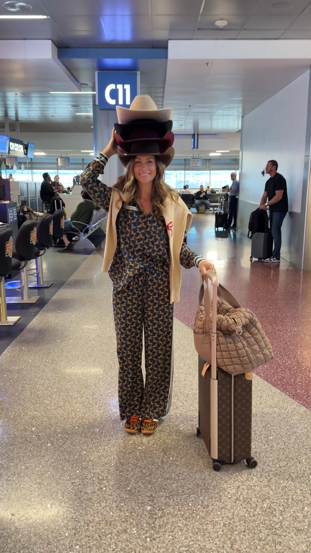 Headed home from NFR with all my hats 🤣 🤠 
Anthropologie set size small
Cardigan size small 
Louis Vuitton luggage
Target weekender bag

#LTKPetite #LTKTravel #LTKootd