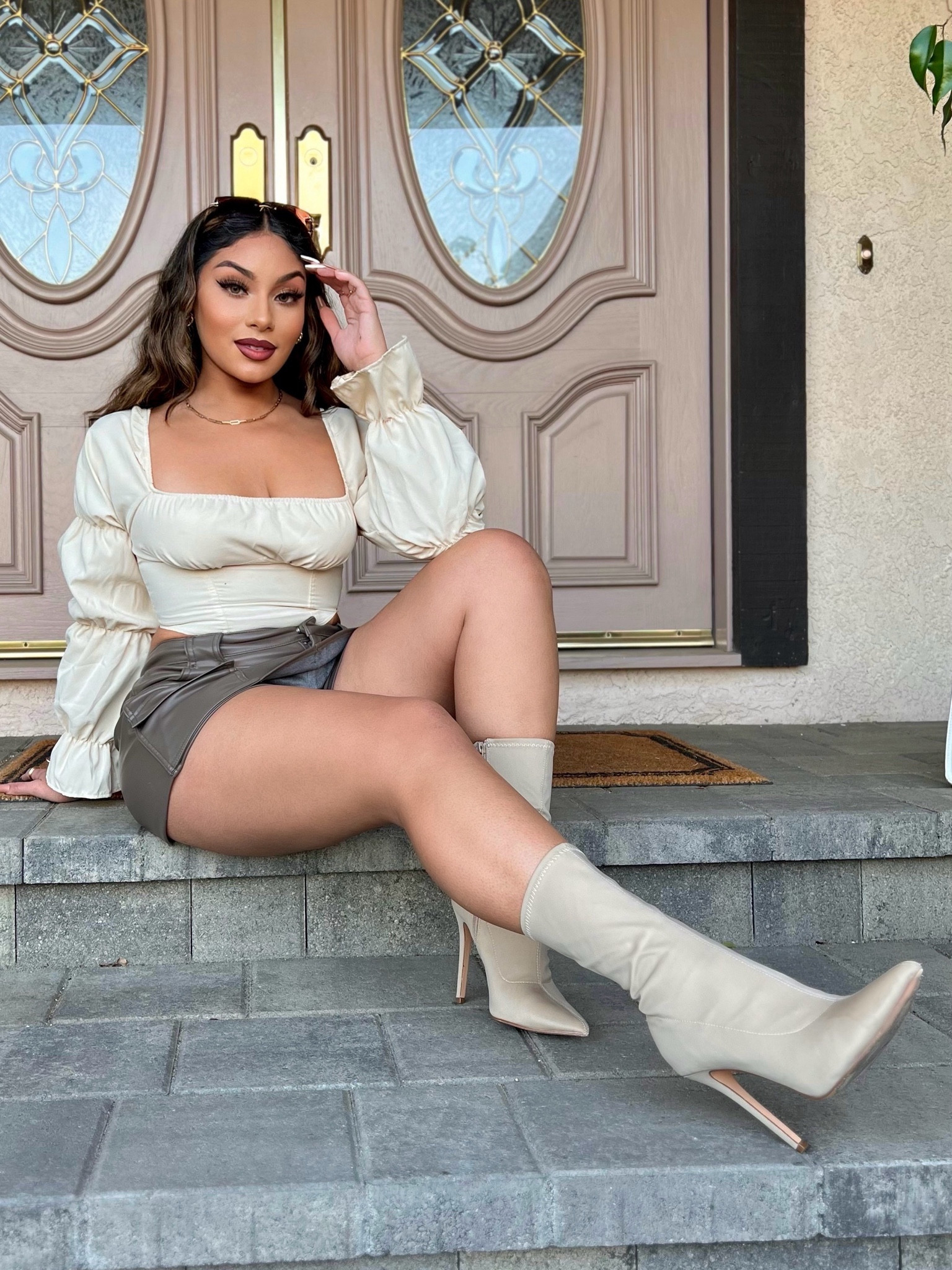 Hope everyone had a fun and safe Thanksgiving 🤎✨ Wearing a beige corset long sleeve crop top paired with a green leather mini shirt, beige sock booties, and brow sunglasses 🥰

#LTKCyberWeek #LTKHoliday #LTKSeasonal
