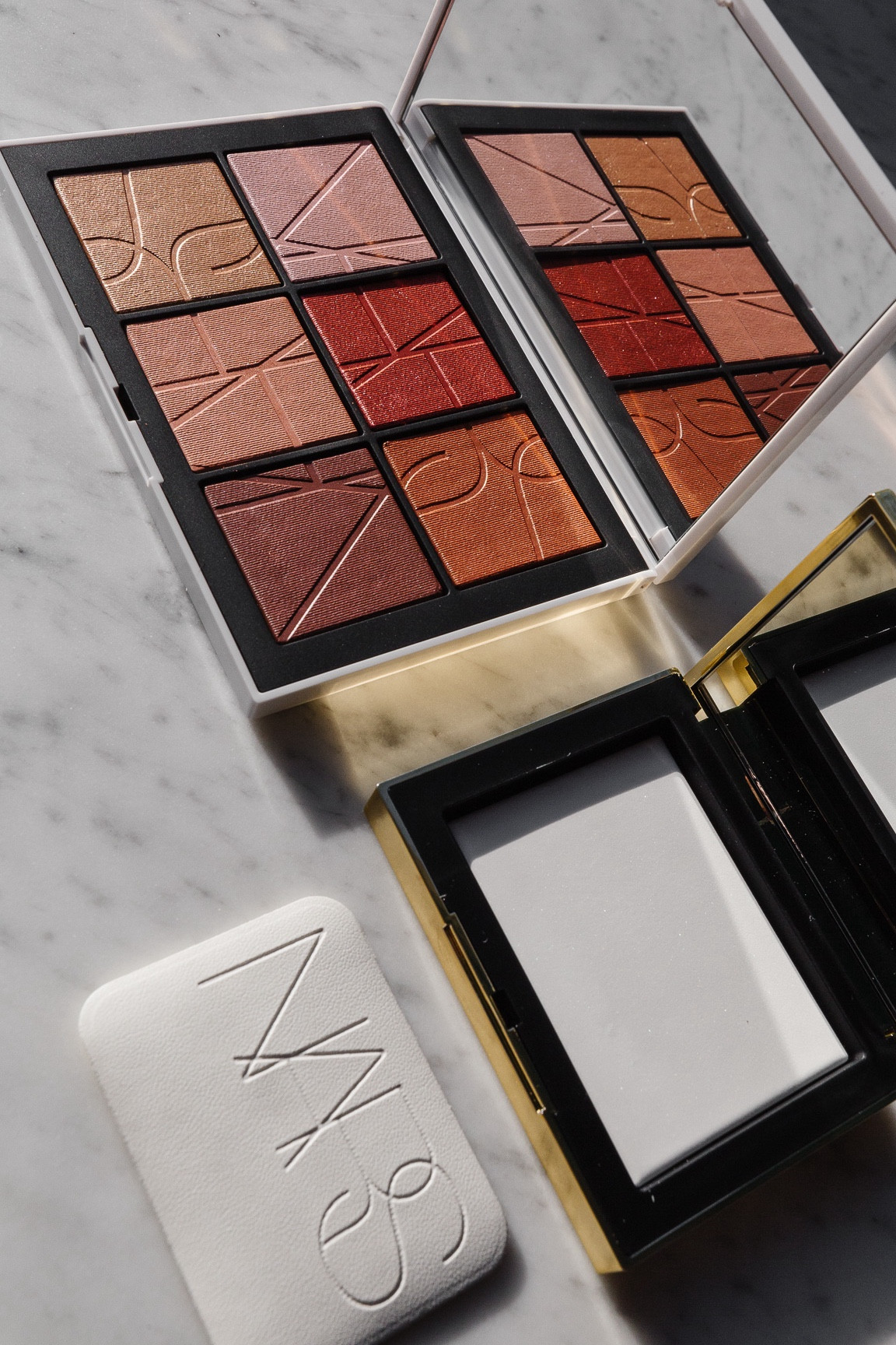 NARS limited edition holiday palette and pressed powder  

#LTKbeauty #LTKSeasonal #LTKHoliday