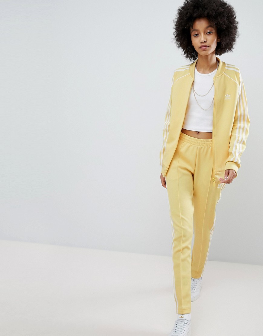 adidas Originals adicolor Three Stripe Track Pants In Yellow - Yellow | ASOS US
