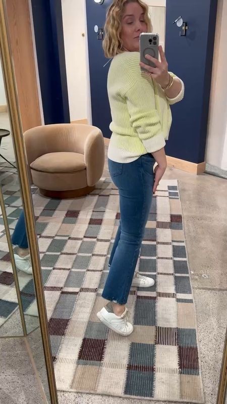 Spring outdoor event look: fresh v-neck sweater, dark cropped denim, white sneakers. Love this color for Spring! This exact sneaker sold out but linking  super similar. Sweater runs large- size down one. Jeans tts. Allison in a small on top and a 29 in the jeans 

#LTKVideo #LTKstyletip #LTKover40