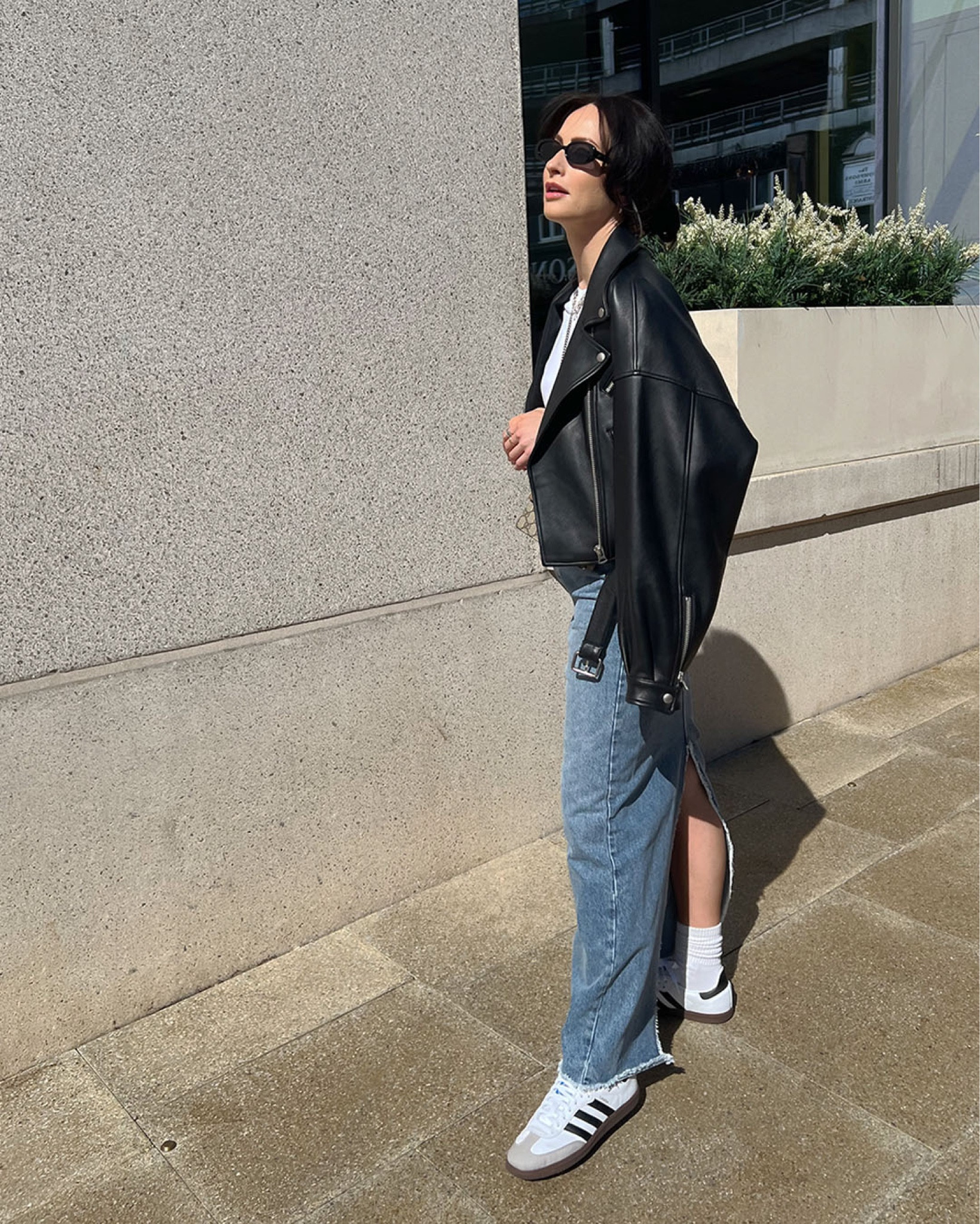 denim maxi-skirt by Raey 
basic white tee by arket 
belt by Isabel marant 
bag by gucci 
socks by arket 
claw clip by arket 
adidas sambas by adidas 
sunglasses by le specs 
leather jacket by ducie alternative linked by all saints 
silver hoops by carat London alternative linked by missoma 

#LTKeurope #LTKSeasonal #LTKstyletip