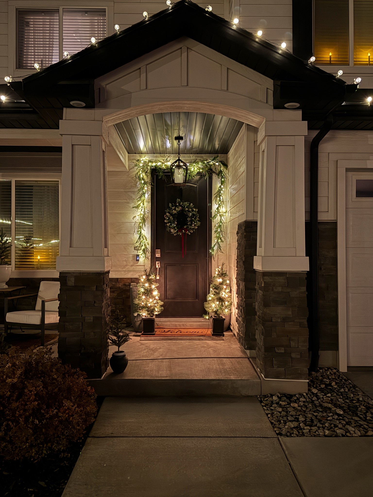 The house is looking a little magical in lights. I love adding battery operated window candles with automatic timers to make it all light up together every night.  
And to save money, I lit my garlands myself with some Michael’s string lights on Black Friday sale. And I linked a few cute porch tree and wreath options for Small Business Saturday. 

#LTKSaleAlert #LTKHoliday #LTKHome