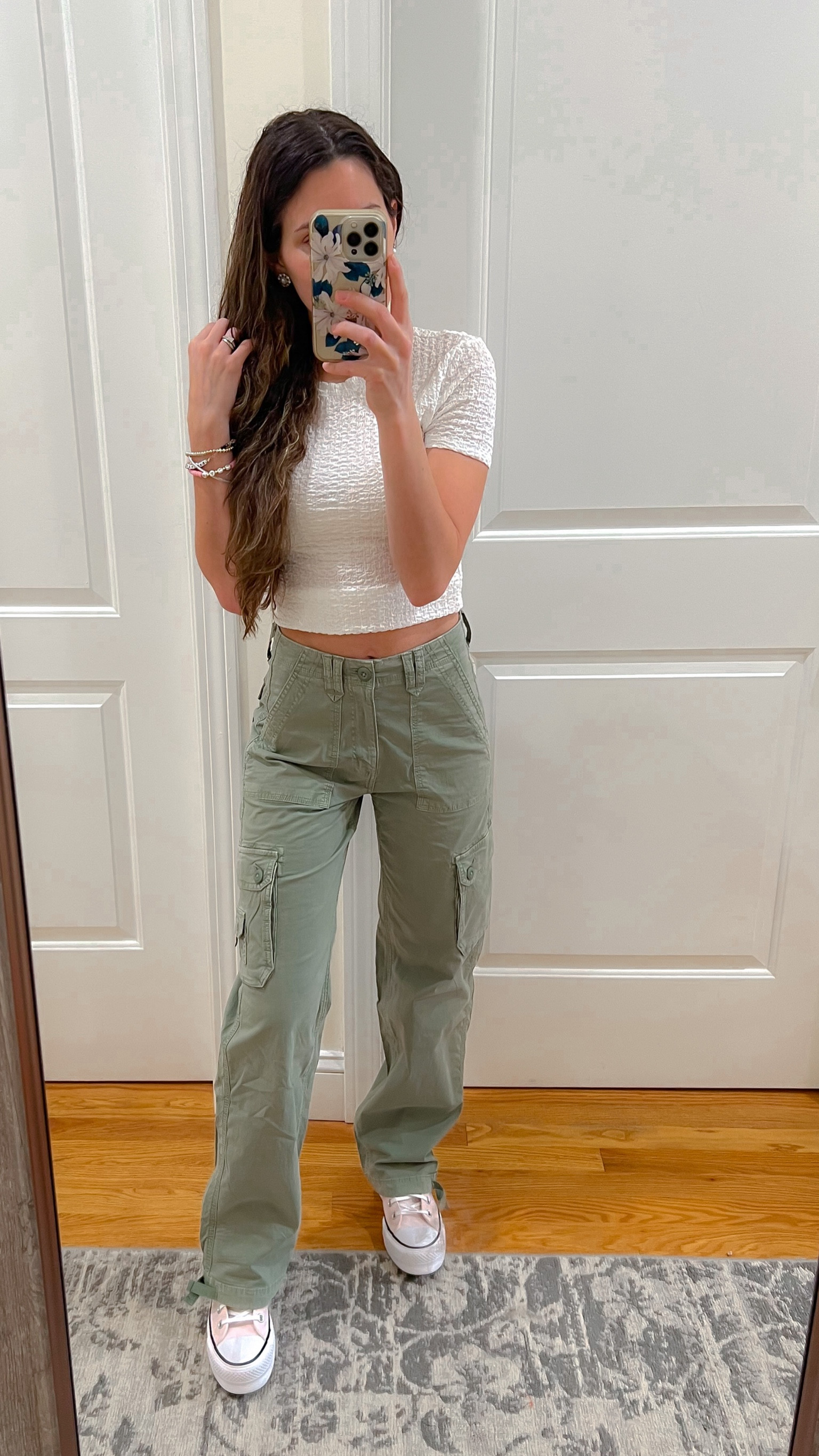 Cargo pants ; cargo trend ; wide leg pants ; converse sneakers ; pink converse ; mom spring outfit ; festival outfit idea  

#LTKFestival #LTKSeasonal #LTKstyletip