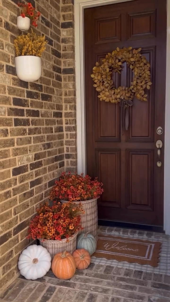 Added some Amazon must-have faux flowers, a pop of yellow in the wreath, and a few pumpkins (mine are Hobby Lobby, but I linked similar ones!) to pull it all together. Simple, affordable, and instantly cozy for the season.

#FallFrontDoorDecor #AmazonHomeFinds #FrontPorchDecor #FallDecor2025 #EntrywayDecor #NeutralFallDecor #FrontPorchInspo #SeasonalDecor #FallHomeStyle
