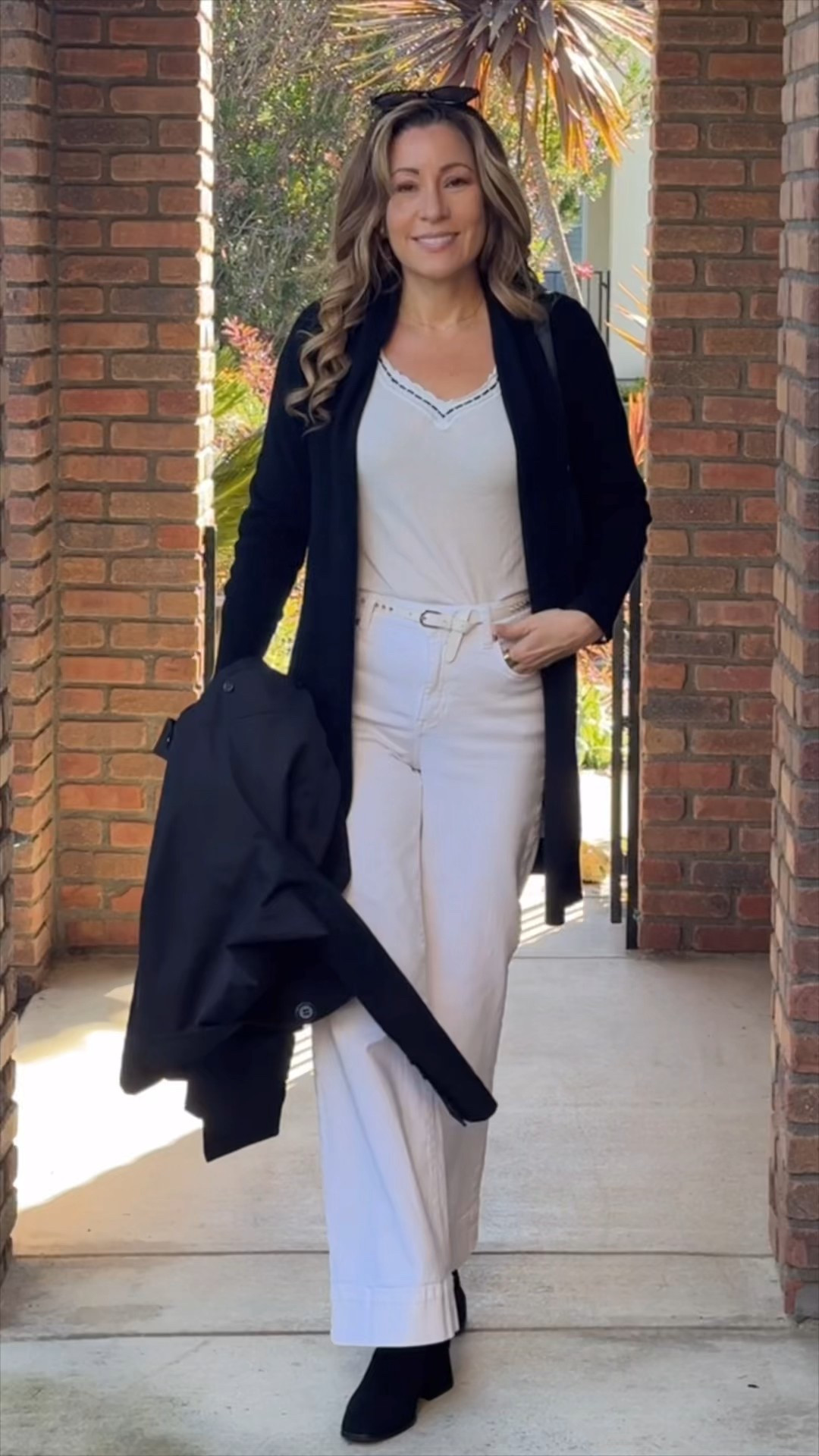 Classic neutrals will never let you down 🤍🖤

A soft white base layered with a long black cardigan is one of my favorite go-to formulas. It instantly elongates, feels refined, and works for everything from lunch to meetings to church.

The key? Keep the base light and streamlined, then add contrast with an outer layer and shoes. You could swap the cardigan for a blazer to dress it up or sneakers to make it casual.

These are the pieces you’ll reach for over and over — and you need this combo in your closet.

Shop everything linked here ✨

#LTKStyleTip #LTKClassicStyle #LTKSeasonal
#fashionover40 #fashionover50 #womensfashion #capsulewardrobe #classicwardrobeessentials #stylishandgrateful

#LTKootd #LTKSeasonal #LTKOver40