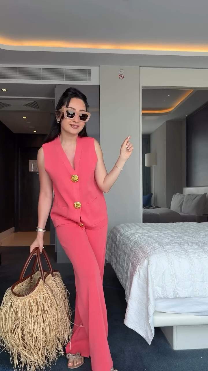 Airport outfit check ✈️ Wearing my favorite @chicwish set in this dreamy coral pink that flatters every skin tone! ☺️ Comfy enough for travel, and with a quick style switch perfect for brunch or a get-together 🍑✨

Comment “coral” for 🔗 to this look. 
#chicwish #loungewearset #amazonfind #amazonfashionfinds #affordablefashionitems #streetstylelook