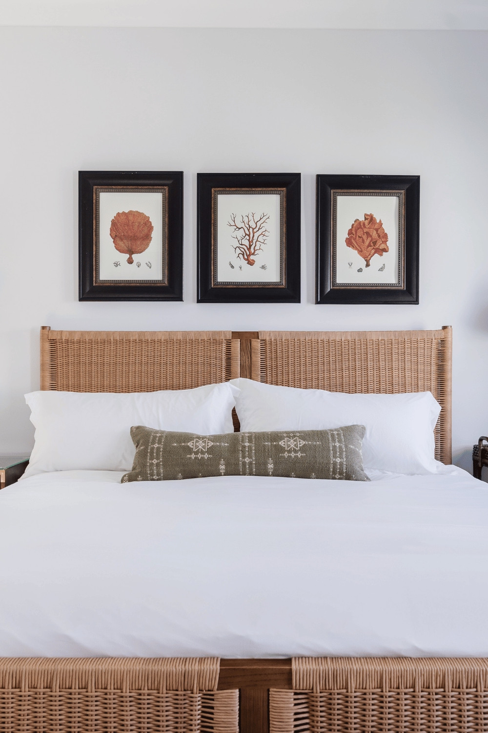 Check out this simply styled beach house bedroom with crisp white cotton sheets, a statement king sized bed, and some thrifted art.  It doesn't have to be complicated to be beautiful!

#rattanbed #beachhousedecor   

 #LTKHome