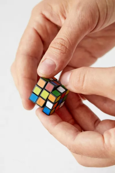 Worlds Smallest Rubik's Cube Puzzle Game in Red at Urban Outfitters | Urban Outfitters (US and RoW)