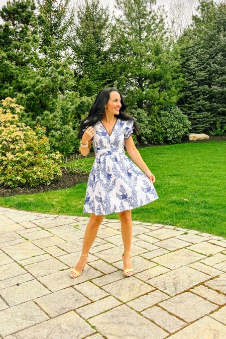 Mini dress with shoulder ruffles on sale 
White and blue dress 

#LTKparties #LTKwedding #LTKsalealert