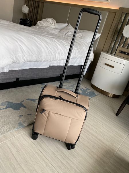 This carry-on rolling luggage is part of a sitewide sale if you buy 2 or more items. It can fit under the airplane seat. I have and love the duffle bag and belt bag of this same line  

#LTKitbag #LTKtravel #LTKover40