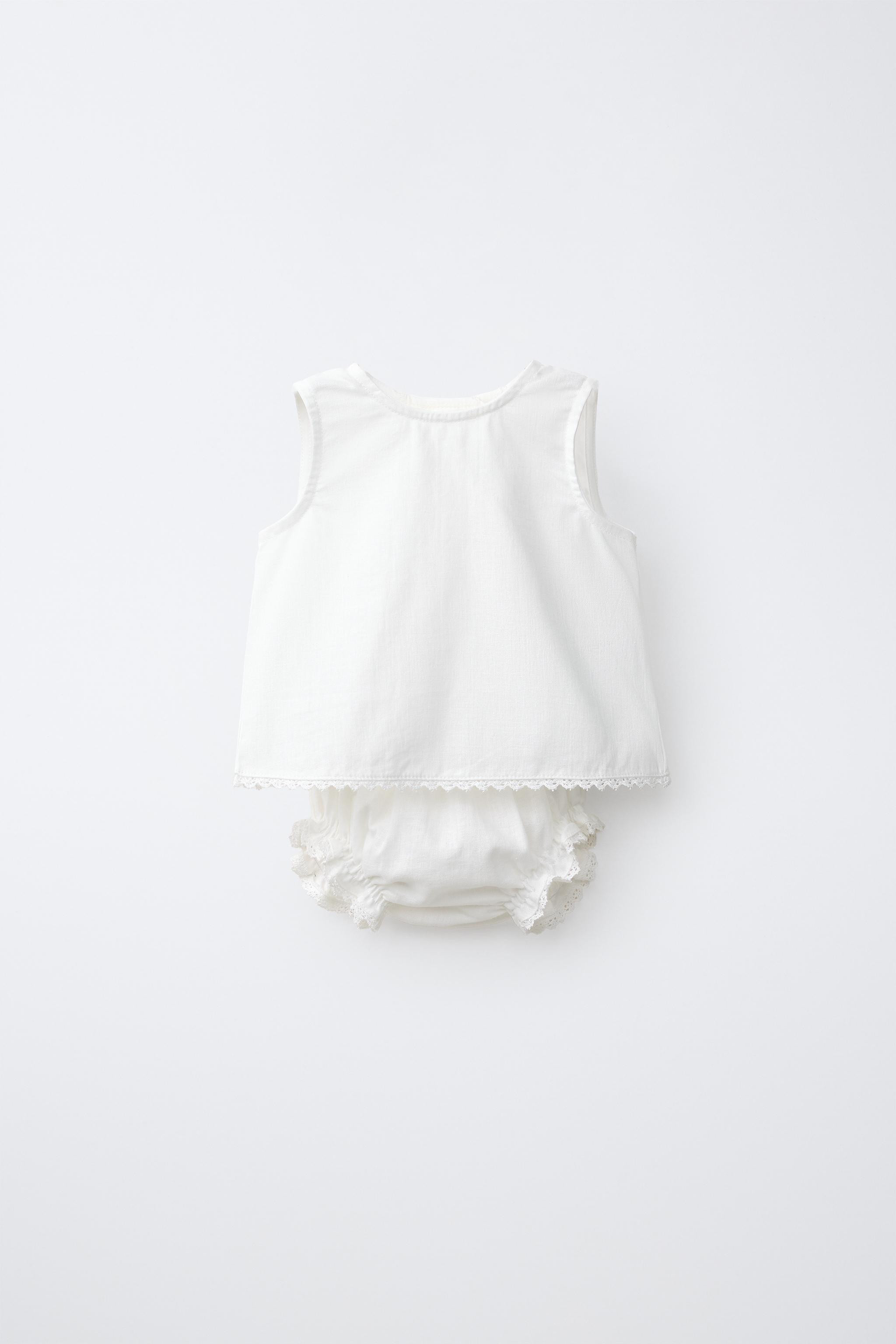 Two-piece set. Blouse with a round neck and sleeveless design. Back button closure. Bloomers with... | Zara US