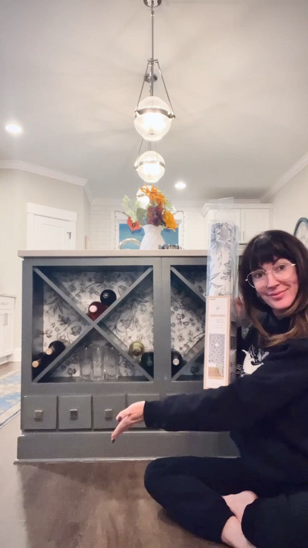 Peel n stick wallpaper project on my wine 🍷 shelves. Not too hard but def takes patience! 

#LTKHome #LTKOver40 #LTKFindsUnder100