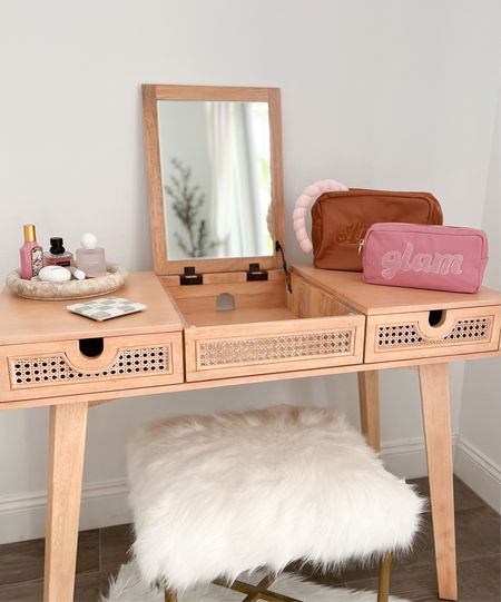 My new bedroom vanity set up ☺️ I love the cane detailing and the pop up mirror! 

urban outfitters, Stoney clover, Target, beauty storage, bedroom decor, dressing table, cane furniture, faux fur stool, makeup bags, pouches, perfumes 

#LTKhome #LTKsalealert #LTKstyletip