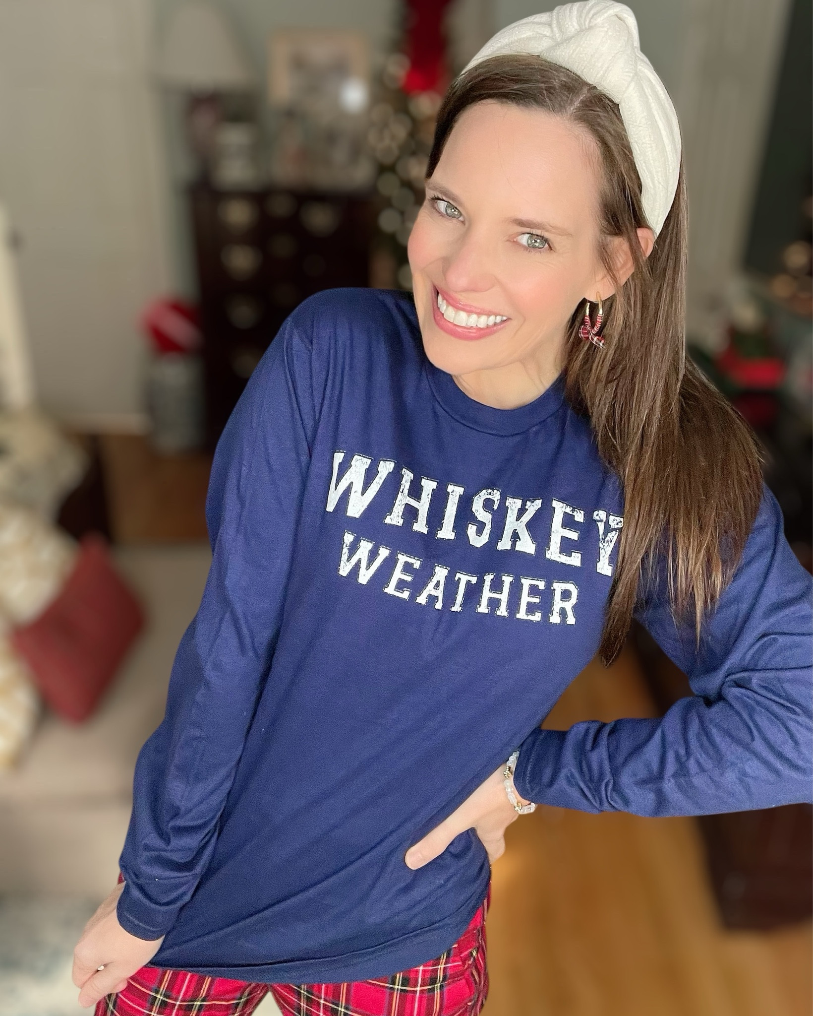 ✨ Whiskey Weather Holiday Outfit — Plaid, Leopard & Cozy Winter Vibes ✨

This fun and festive look mixes all my favorite holiday textures — classic red tartan pants, the coziest navy “Whiskey Weather” long sleeve, a tartan headband, and a little pop of leopard to finish it off. The perfect comfy-but-cute outfit for holiday parties, girls’ nights, cookie baking, or sipping something warm by the tree.

The tartan pants are a cropped straight-leg fit and so flattering with heels or flats. The navy graphic top is soft, lightweight, and easy to layer under vests or cardigans all season long. Added my $10 BaubleBar bracelets for sparkle and the cutest plaid bow earrings (only $5!) to tie everything together.

whiskey weather shirt • navy holiday graphic tee • tartan pants outfit • plaid christmas pants • leopard heels • holiday party outfit • cozy winter style • tartan headband • BaubleBar bracelets • budget-friendly holiday look • christmas fashion inspo

#LTKHoliday #LTKGiftGuide #LTKCyberWeek