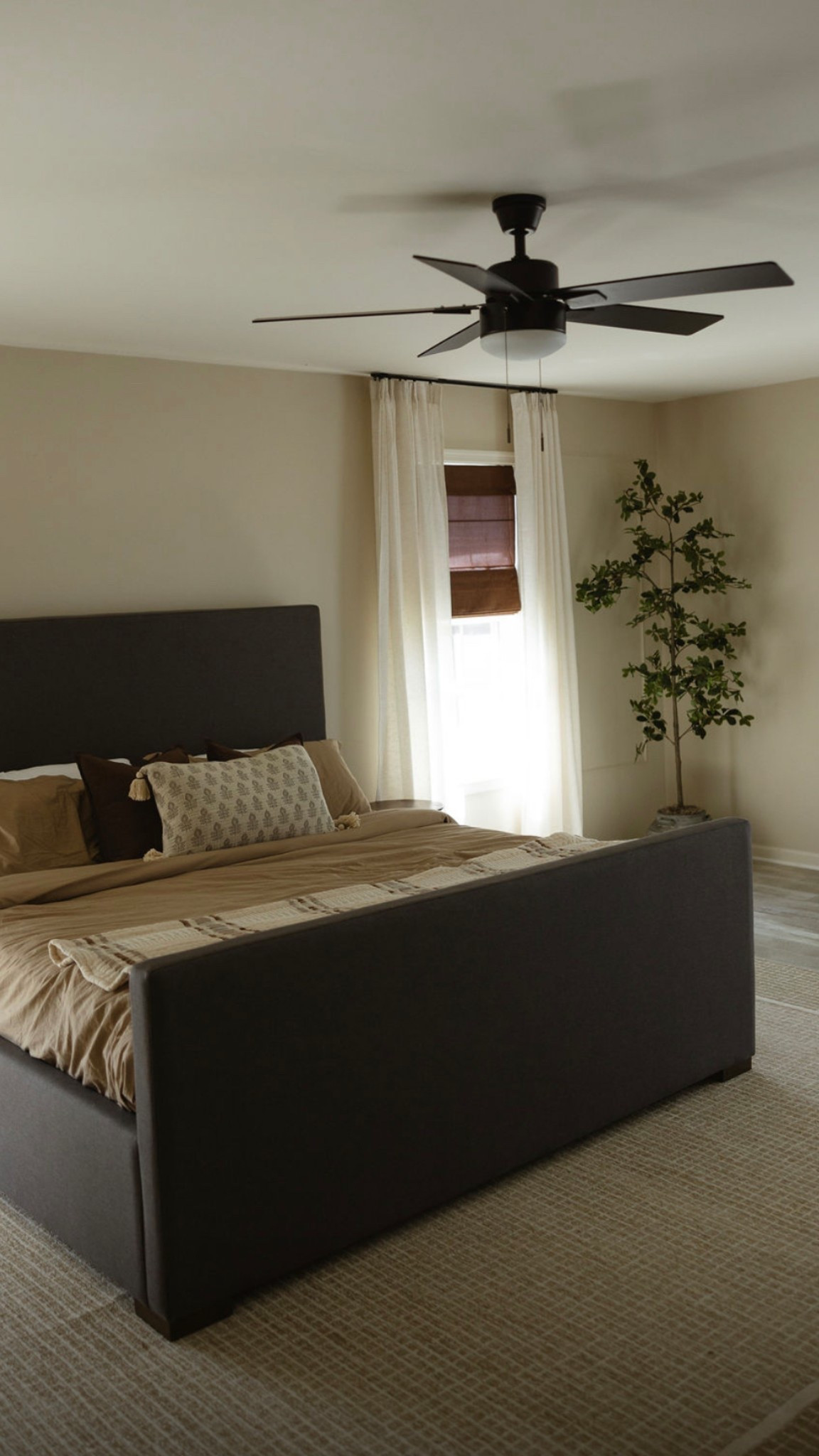 Cozy master bedroom with Roman shades, faux plant, and pinch pleat curtains #bedframe #romanshades #pinchpleatcurtains #fauxplant 

#LTKHome