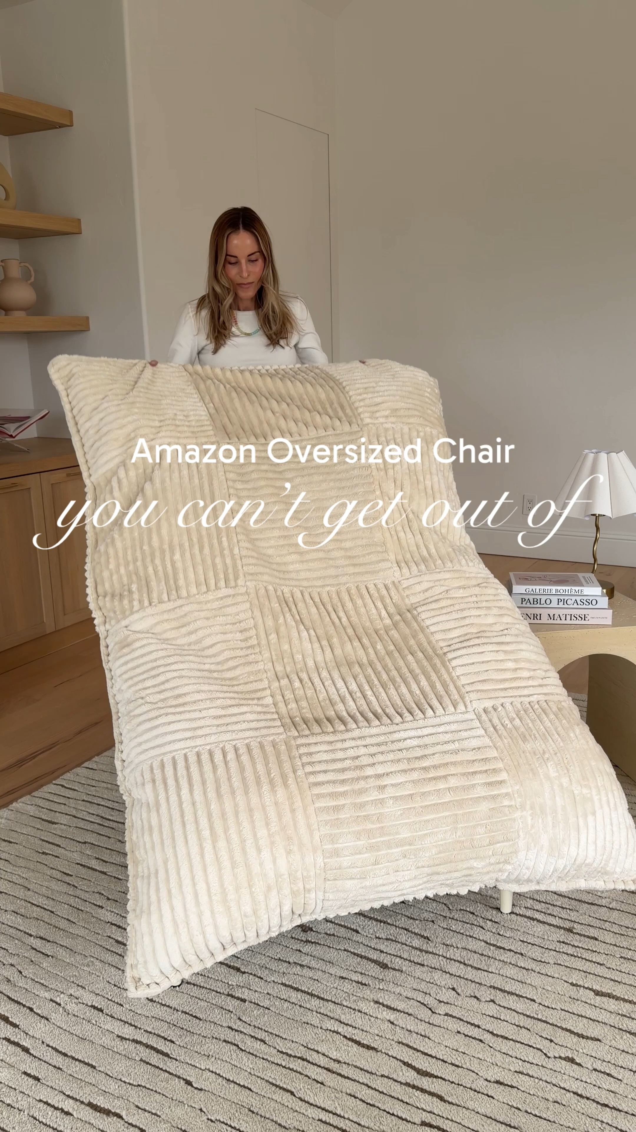 A Giant Bean Bag Lounge Chair with a sturdy metal frame and washable cover is a modern hybrid between a traditional bean bag and a structured lounge chair. It combines soft, sink-in comfort with firm support and durability. 

 #LTKdayinmylife #LTKmomlife #LTKHome