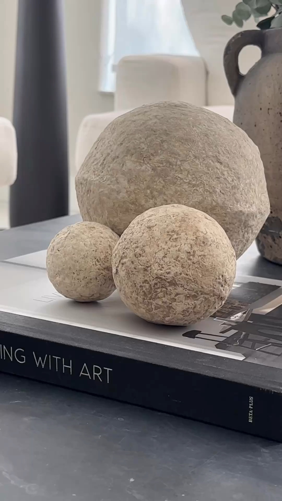 Decorating accessories that add texture to any decor.
#neutraldecor #spheres #papermache 

#LTKstorytime #LTKSeasonal #LTKHome