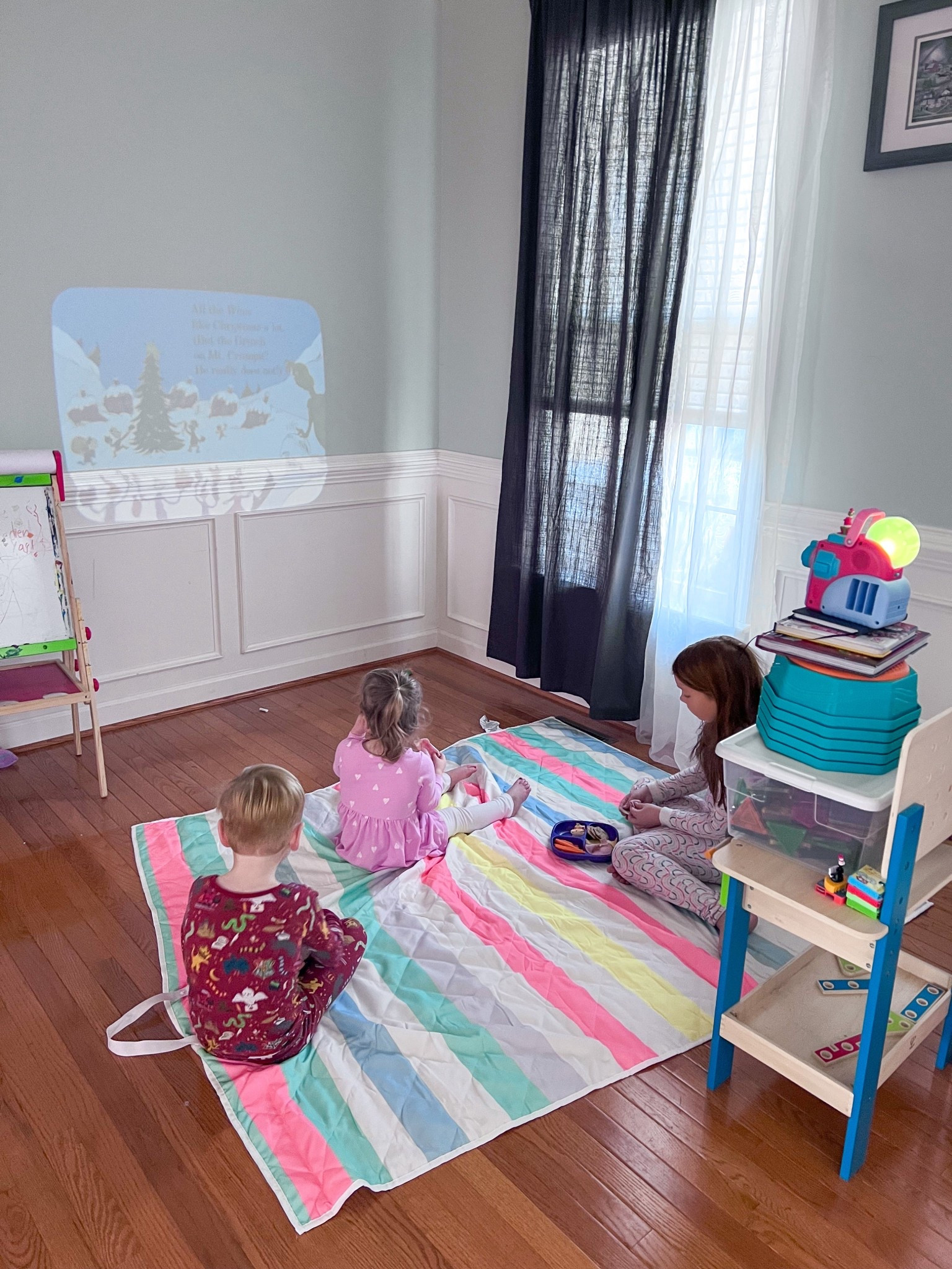 We got this Dream Machine as an early Christmas gift for my 2 year old and it's a hit with all 3! They're having an indoor picnic while listening to stories. Definitely recommend for toddlers even if you have a Yoto or Tonie player.

#LTKHoliday #LTKGiftGuide #LTKKids