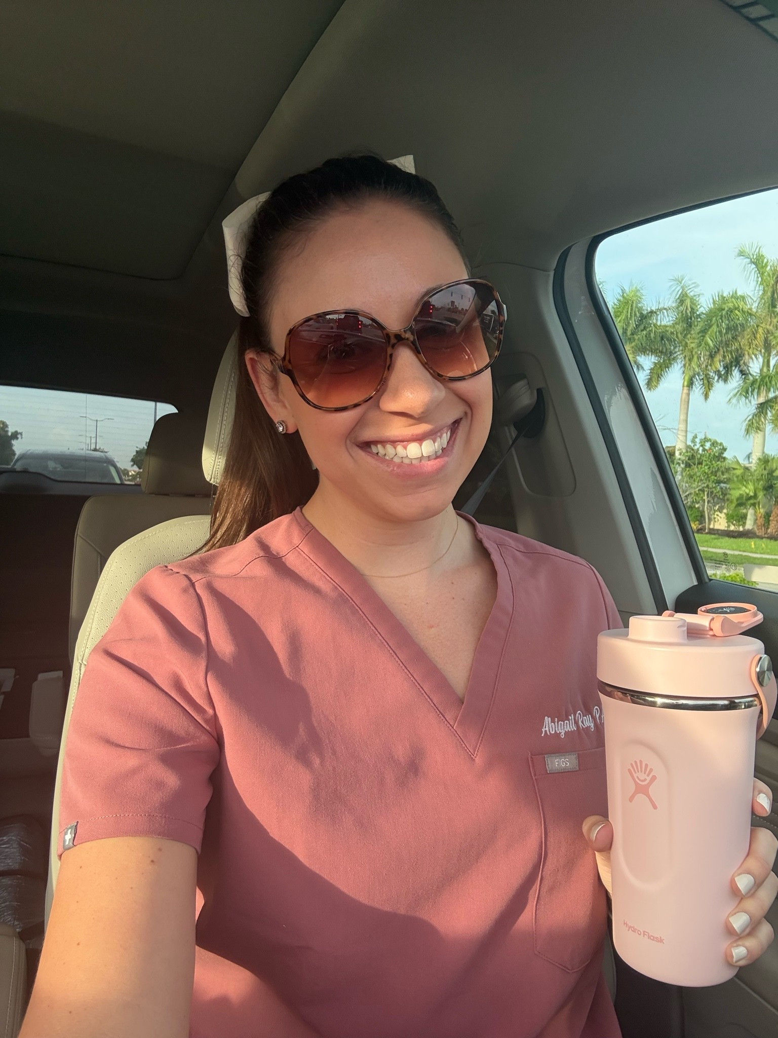 Good morning! Feeling the sunshine with my Figs scrubs, hair bow and Hydroflask shaker bottle!

#LTKmorningroutine #LTKdayinmylife #LTKootd