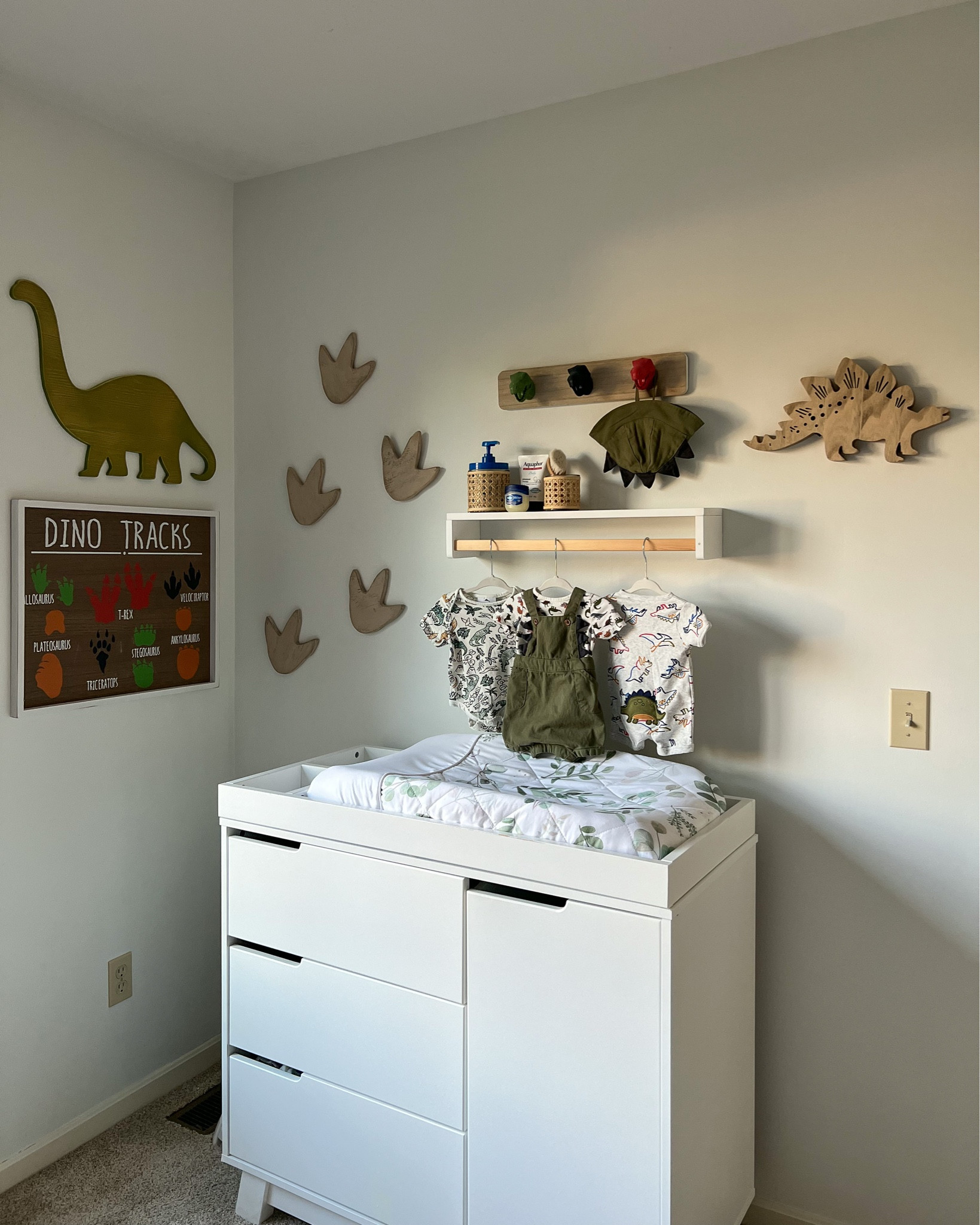 Boho Dino nursery decor. Dinosaur nursery decor. Babyletto changer dresser. Dinosaur footprints. Changing table. Nursery shelves. Dinosaur decor. Boy nursery. Boy room decor. Baby boy nursery room. Nursery decor. 

#LTKbaby #LTKfamily