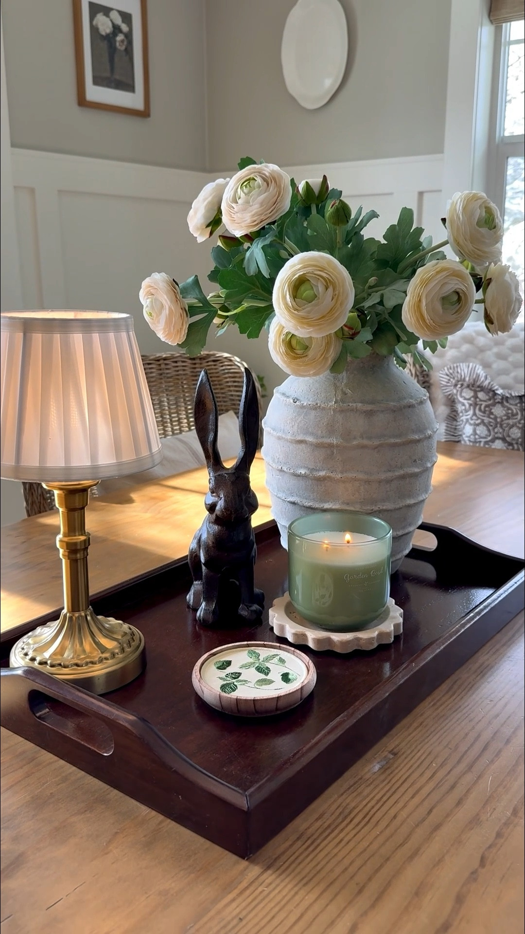Love this creative idea! Here it is:

🐰 Who says a dinner tray has to stay a dinner tray?
I pulled the tray right off the stand, and just like that — the most charming little centerpiece base was born. ✨
Neutral blooms that are soft and effortless, a whimsical bunny that makes you smile every single time, and a whole lot of proof that the best styling ideas come from thinking just a little sideways. 🌸
Creativity over cost. Charm over perfection. That's the kind of decorating I live for. 💛