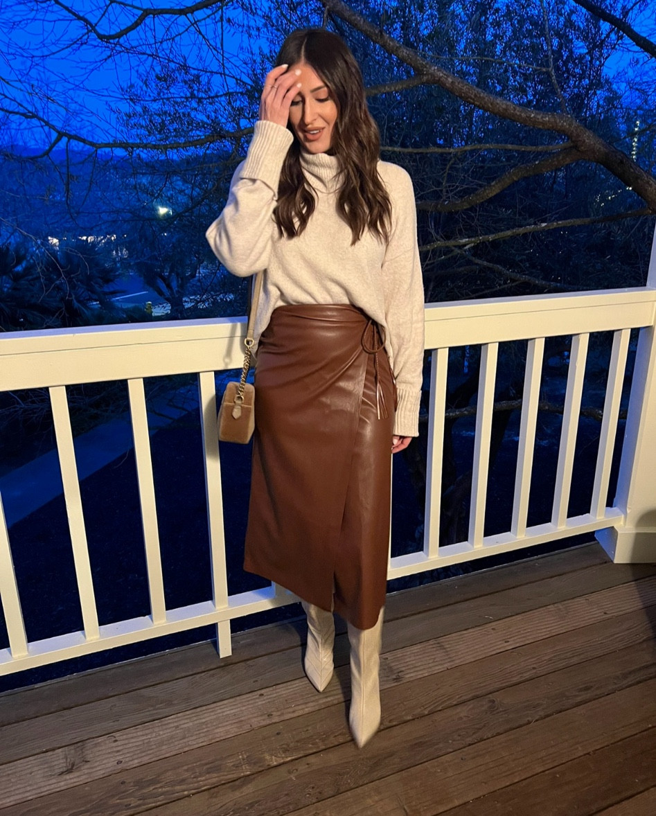 Napa outfit idea - cozy sweater with leather midi skirt and white boots 

#LTKshoecrush #LTKstyletip #LTKtravel