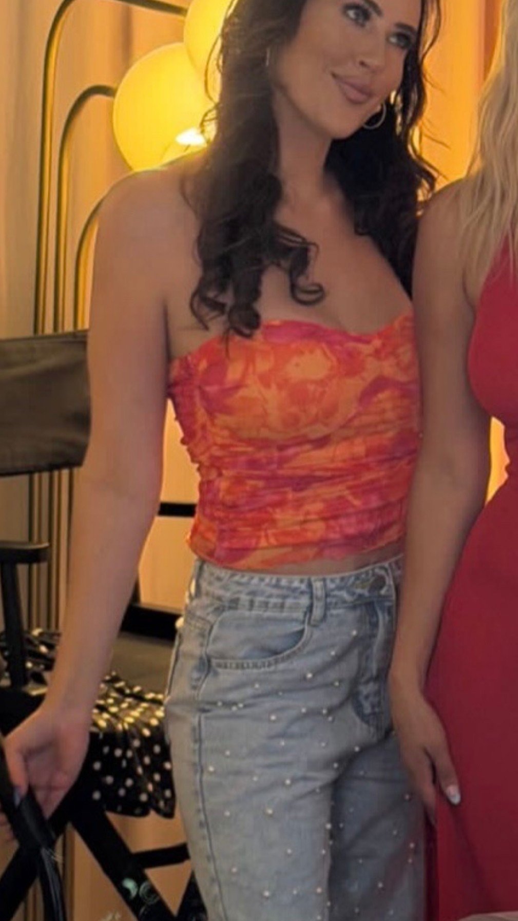 Orange tube top & pearl jeans!

#LTKootd