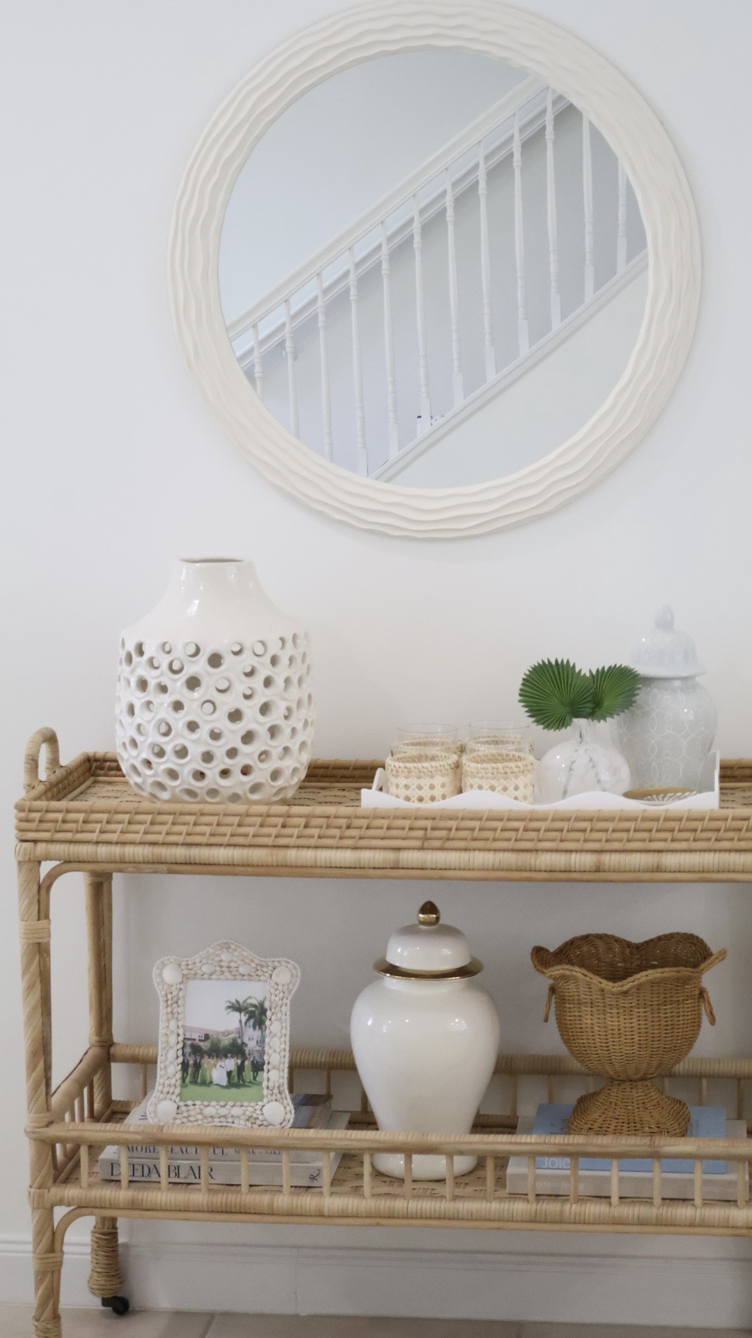Bar cart + coastal textured white mirror styling! 🪞🤍🐚

HomeGoods does it again 🤍 This coastal mirror was such a good designer look for less find! I styled it above my rattan console table with woven textures, white ceramics, and natural accents for an effortless Serena & Lily inspired coastal home look. If you love affordable coastal home decor, HomeGoods finds, Nancy Meyers style, grandmillennial decor, rattan furniture, woven decor, and designer home decor for less, this one is for you! Linking similar coastal mirrors + look for less home decor to recreate the look. 🌴✨

#LTKdayinmylife #LTKHome #LTKSaleAlert