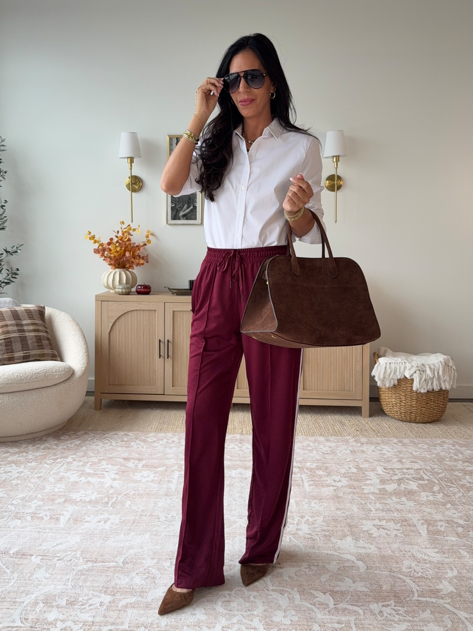 Elevating the track pant for the holidays. 
Love adding a button down or a sweater. 
Top- medium 
Pants come in 4 lengths (wearing a small tallest 


#LTKHoliday #LTKU #LTKOver40