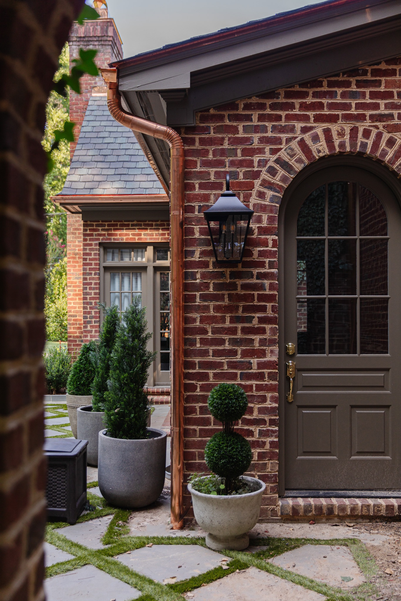 Our new copper gutters are nothing short of captivating 😍 sharing all about the pros and cons (and how much they cost) at ChrisLovesJulia.com today.

Planter, faux topiary plants, outdoor wall lantern sconce

#LTKHome #LTKStyleTip #LTKSeasonal
