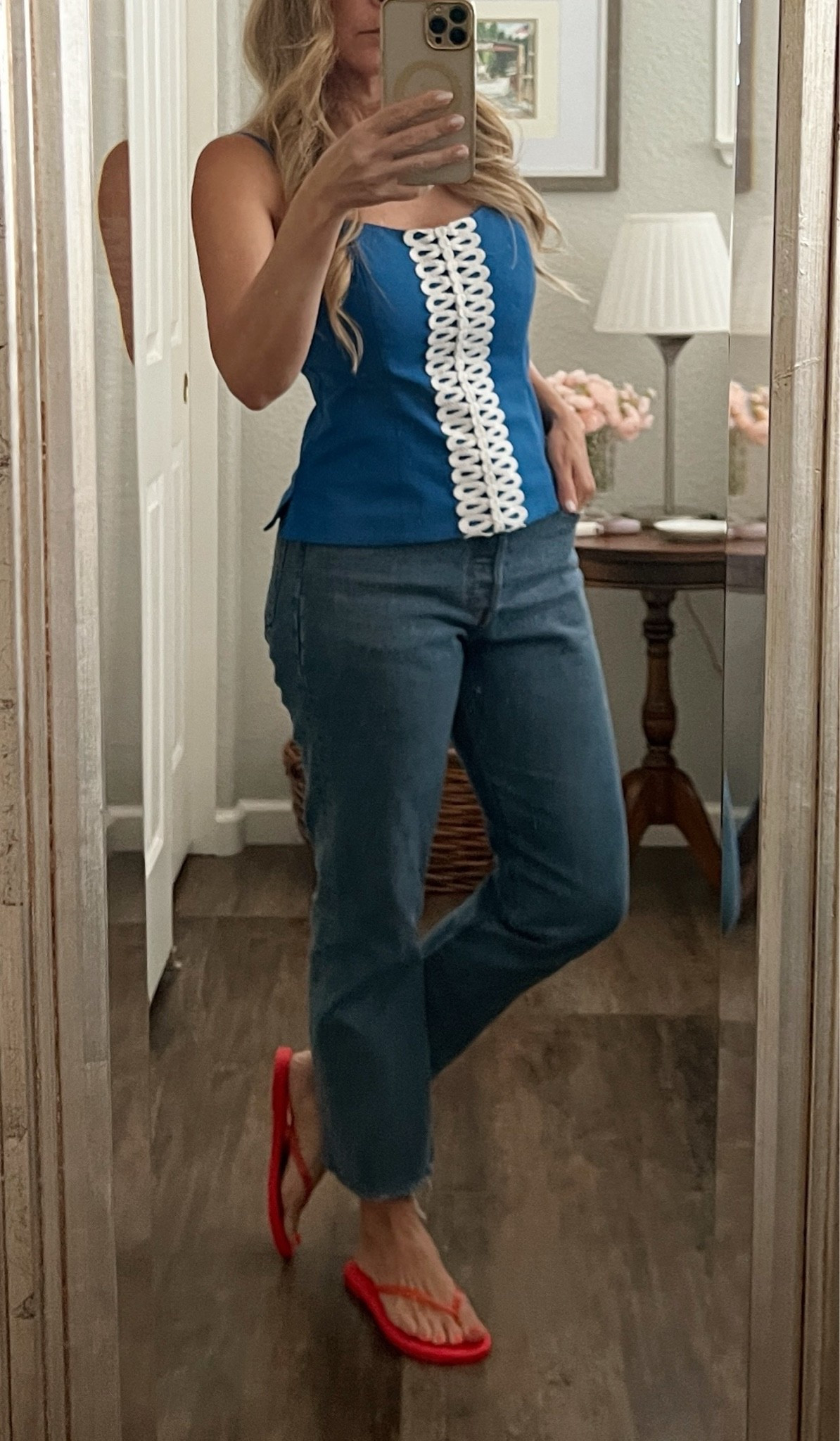 If you love Lilly, try the Shelli tank. It’s very classic lilly. My color is no longer available but the new color, navy is perfect 

I love that you can dress it up and I do wear it with white shorts, white jeans, but I also love it with the Levi’s and tkees 

Top is petite friendly 

Xo,
Jill 💋

#LTKOver40 #LTKPetite #LTKSeasonal