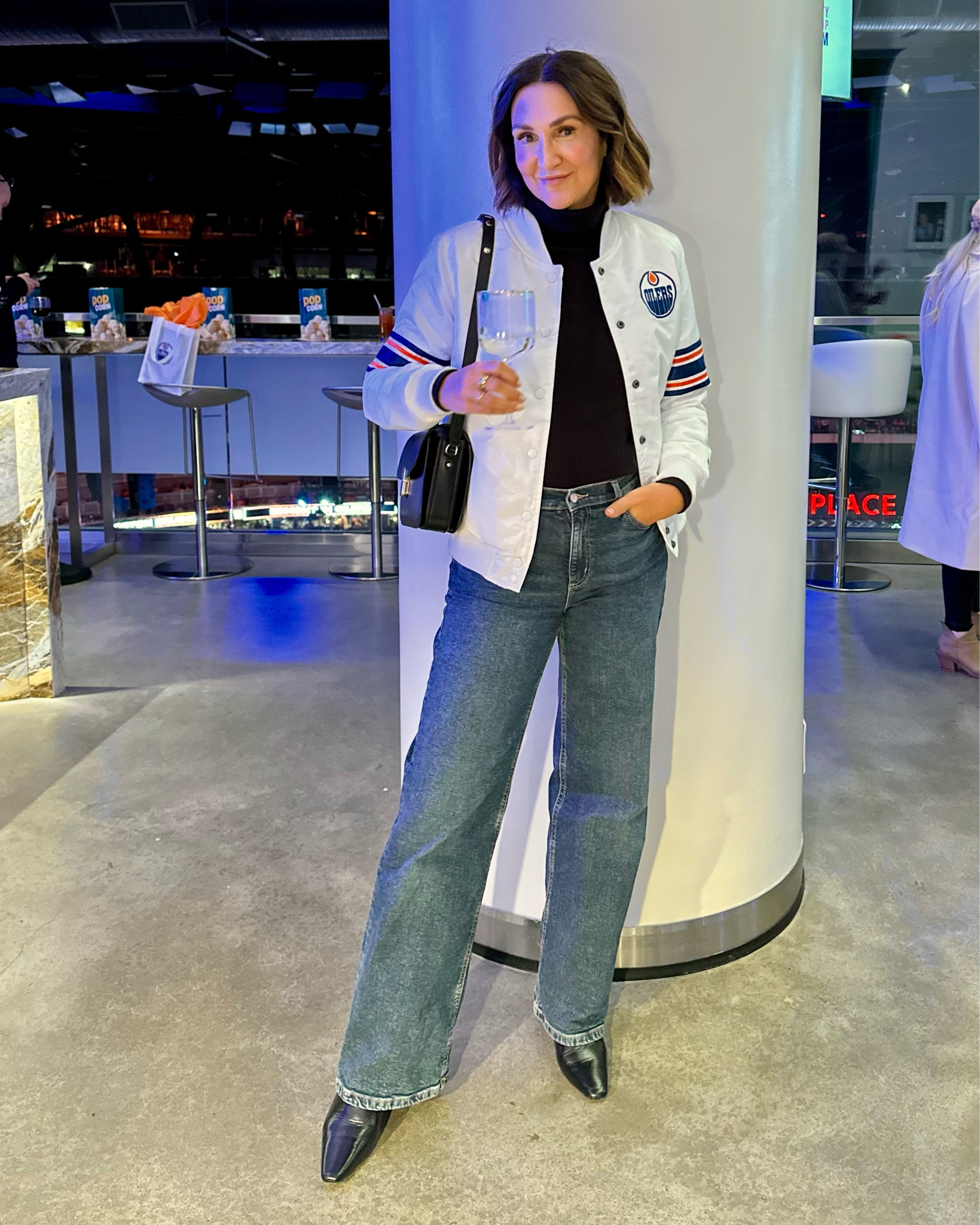 Game day fit!
My Oilers bomber jacket is old but I linked similar and my exact turtleneck and jeans - both fit tts!
Boots have the cutest little kitten heel and look elevated but are so comfortable. Also fit tts.

#LTKstyletip #LTKitbag #LTKshoecrush