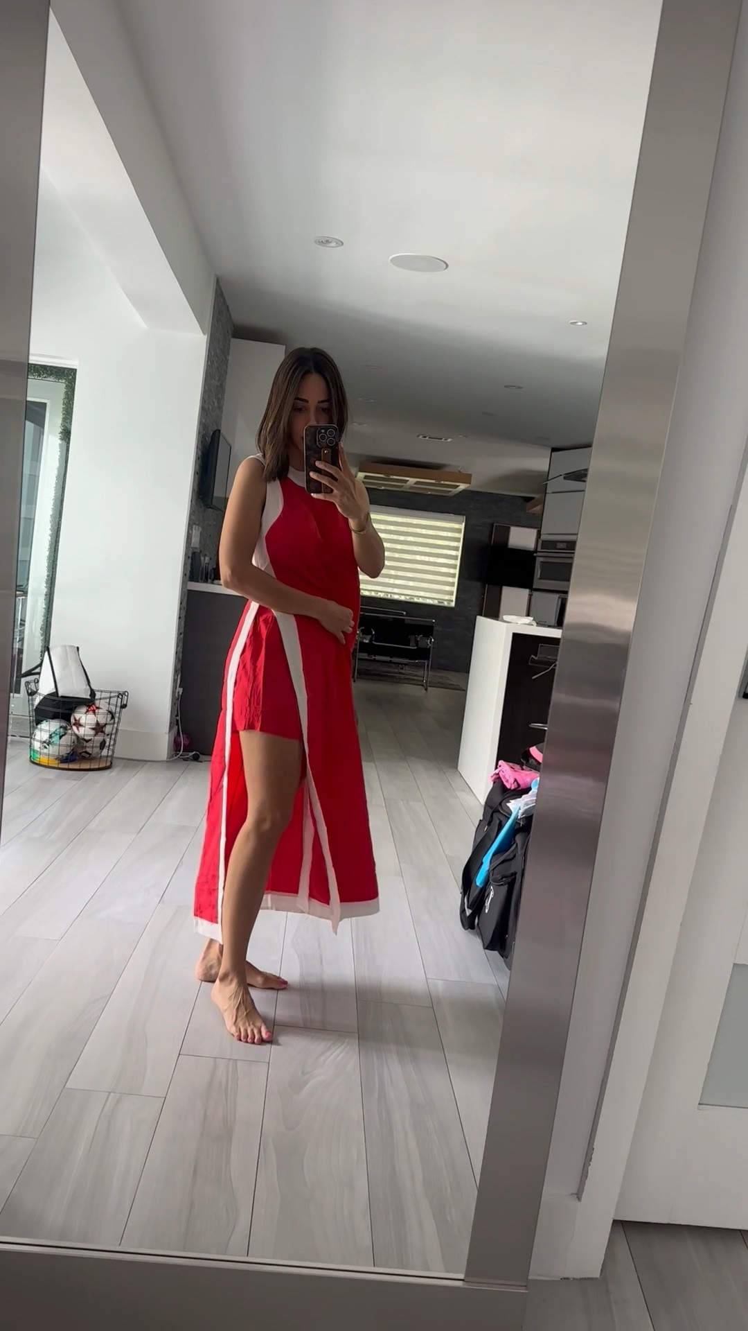 This long dress and shorts outfit features a vibrant bohemian-inspired color block pattern, perfect for adding a unique and trendy touch to your summer wardrobe that is both elegant and functional.