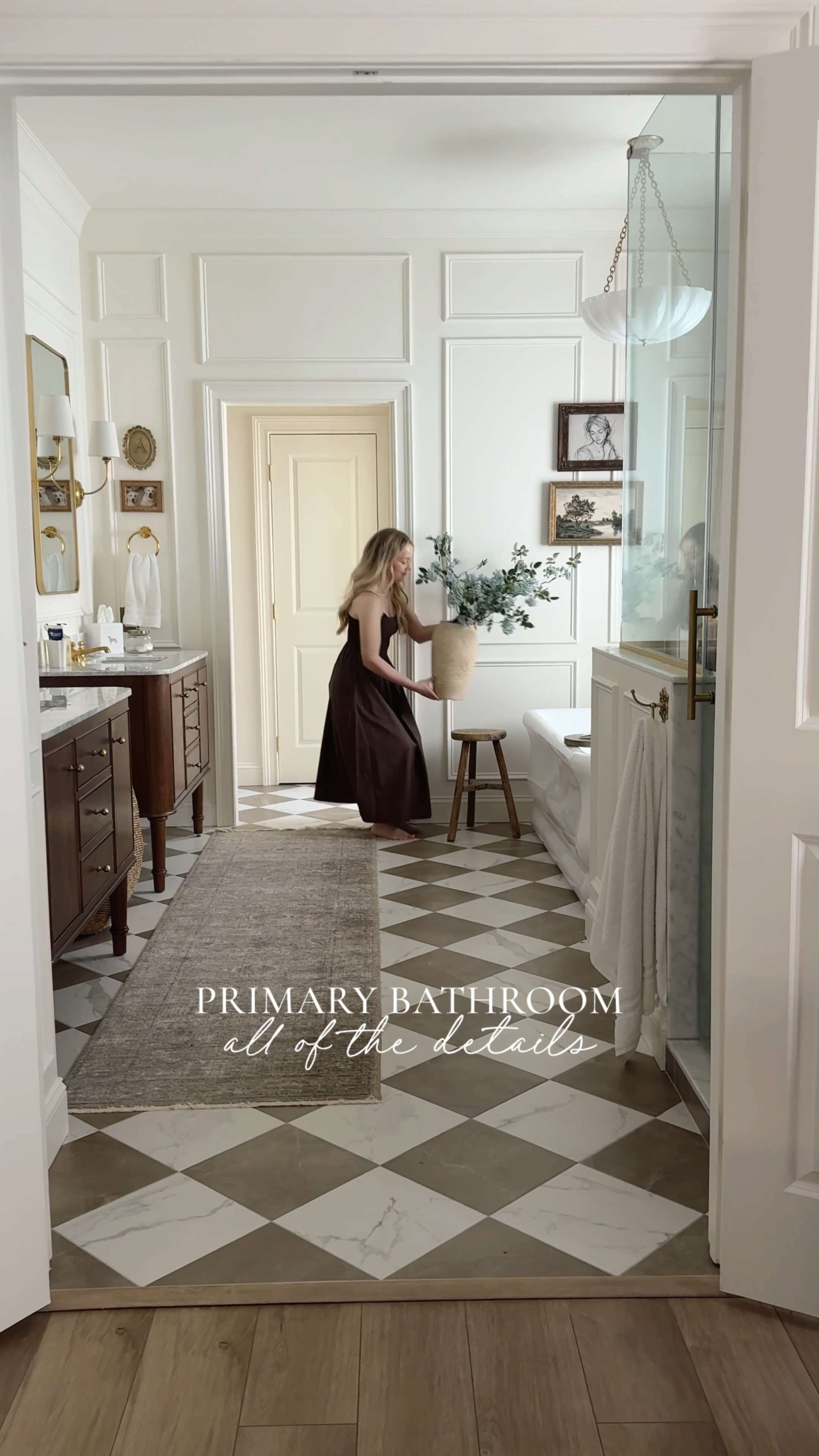 Sharing all the details from my primary bathroom — this space is truly all about the little things.

I went with unlacquered brass throughout. I love the beauty of it and how it naturally ages over time. That patina adds so much character and depth in a way that just feels right.

Paired it with rich wood tones and a marble topped vanity — you already know my love for materials that age naturally and tell a story. It all just gets better with time.

The mocha and white diamond checker flooring brings in warmth while still feeling timeless. And the picture frame molding adds that layer of charm that makes the whole space feel more custom and finished.

Lighting was a big focus too — brass sconces with linen shades for that soft, cozy glow, and the milky glass chandelier over the tub that gives the prettiest light when it’s on.

I’m always drawn to spaces that focus on the details — even down to the dimmers and toggle switches. It’s those small touches that make everything feel complete. 

 

#LTKSeasonal #LTKHome #LTKSaleAlert