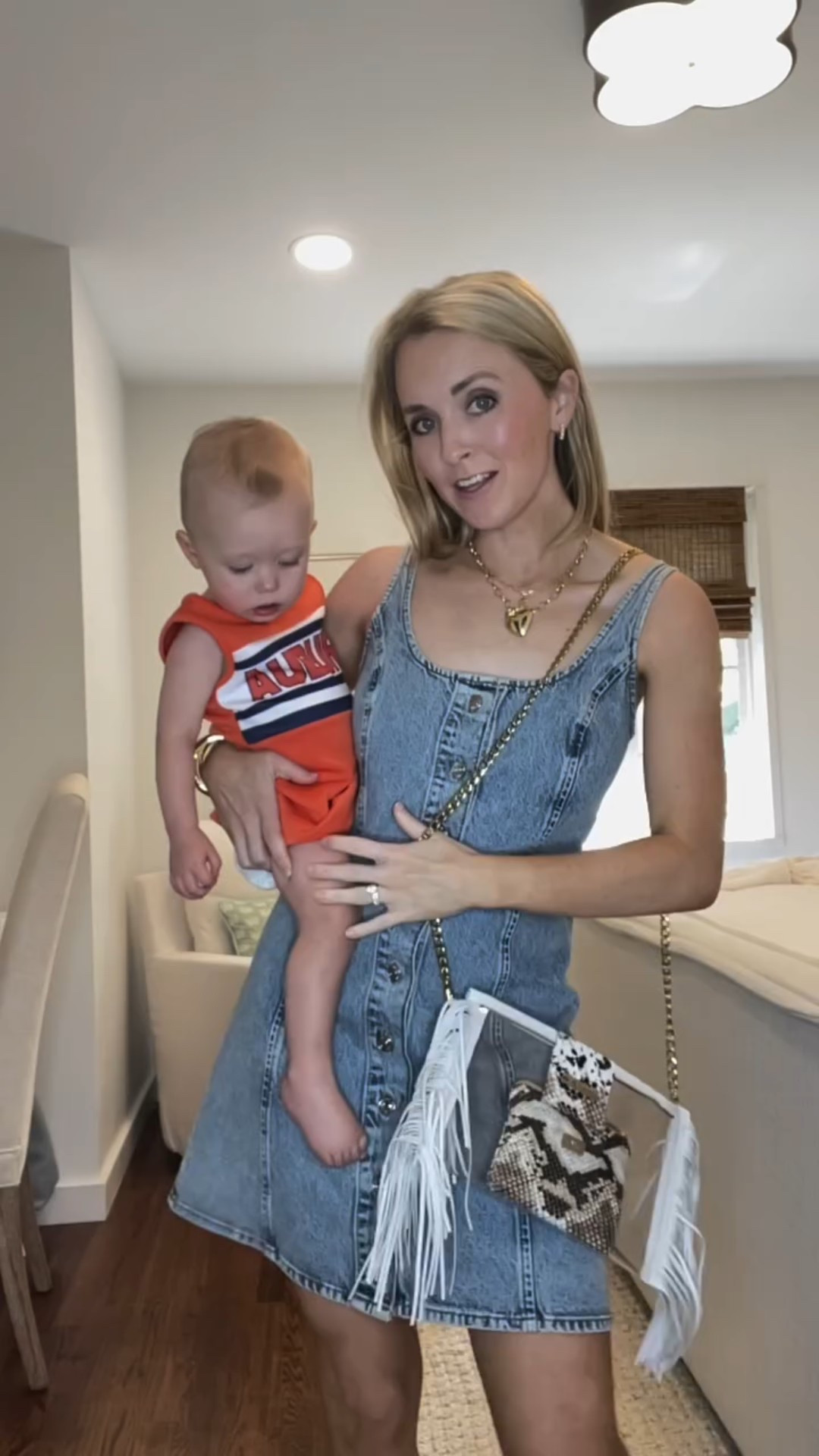 So excited to take Eloise to her first Auburn football game this fall! We’re officially game day ready with our new clear bag from @kmchandbags 🫶🏻 

I love that it can be styled as a clutch or a crossbody—so versatile! Plus, the mini zip pouch is perfect for keeping my cards, ID, and lipstick all in one place.” 
 
#gamedayready #cuteclearbag